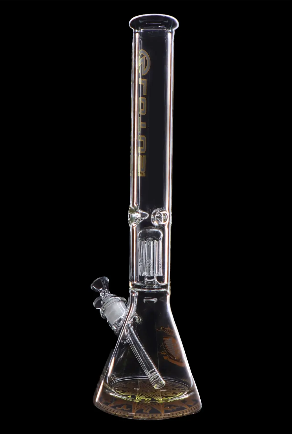 Tall glass bong with intricate percolator and clear liquid at the base, isolated on a black background.
