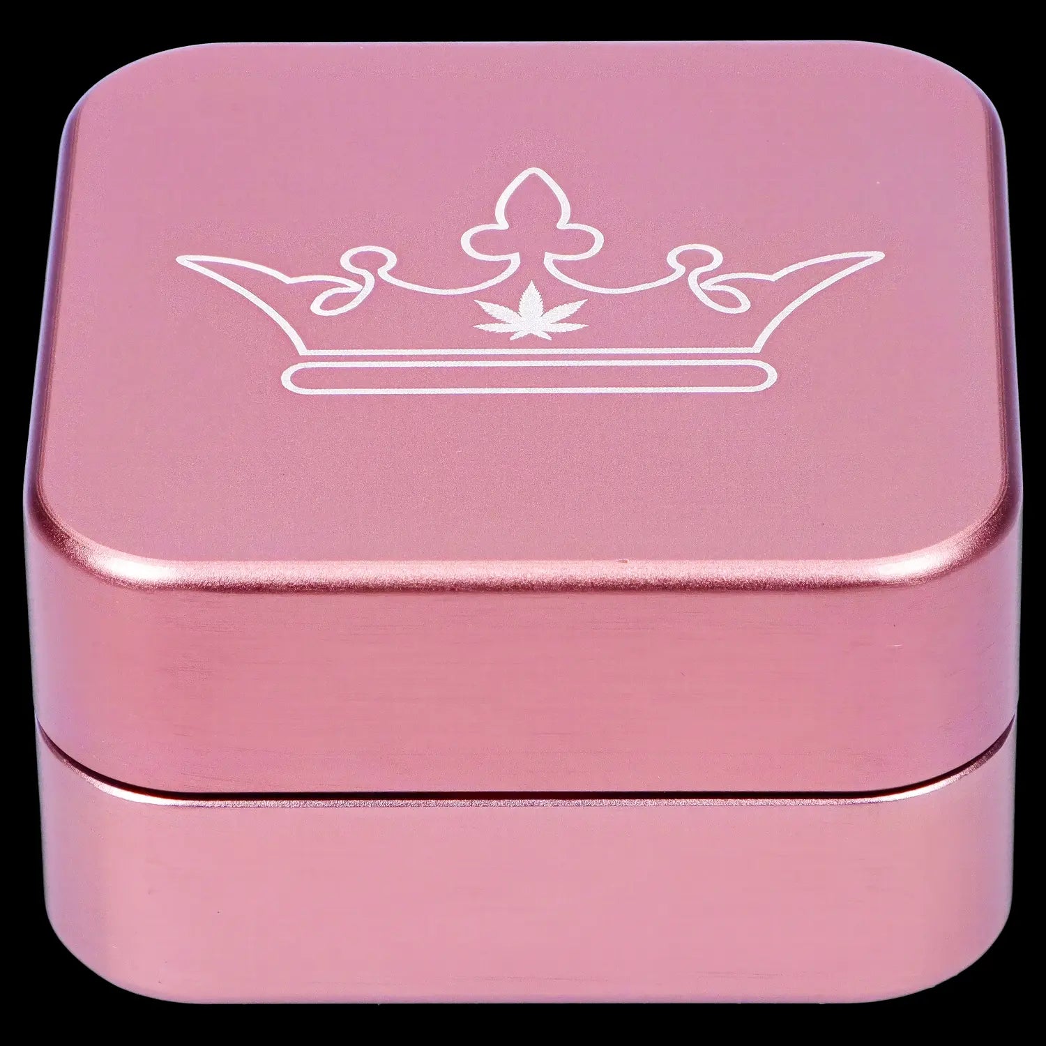 Pink metal grinder with a cannabis leaf-adorned crown design.