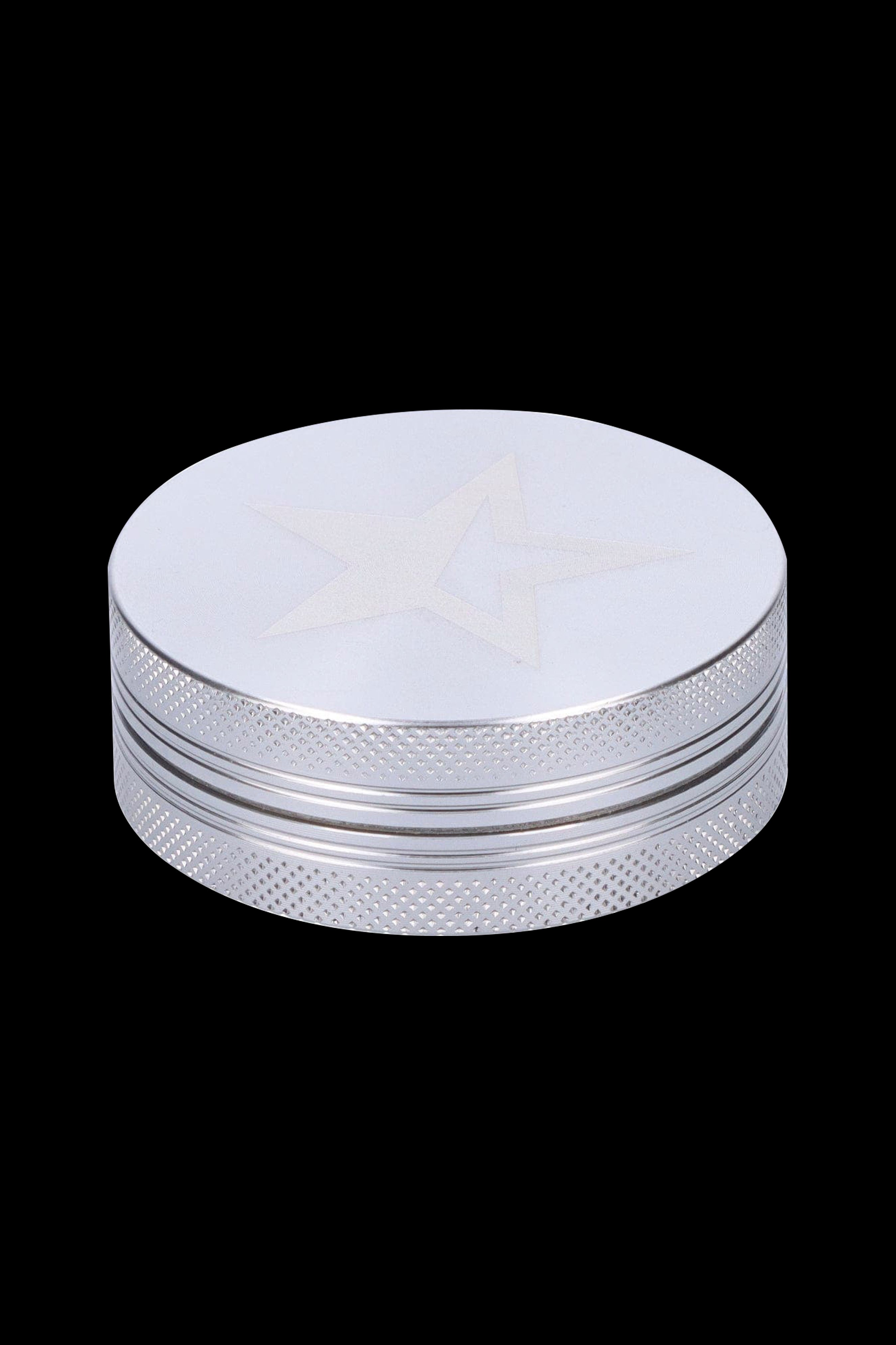 Silver metal grinder for cannabis.