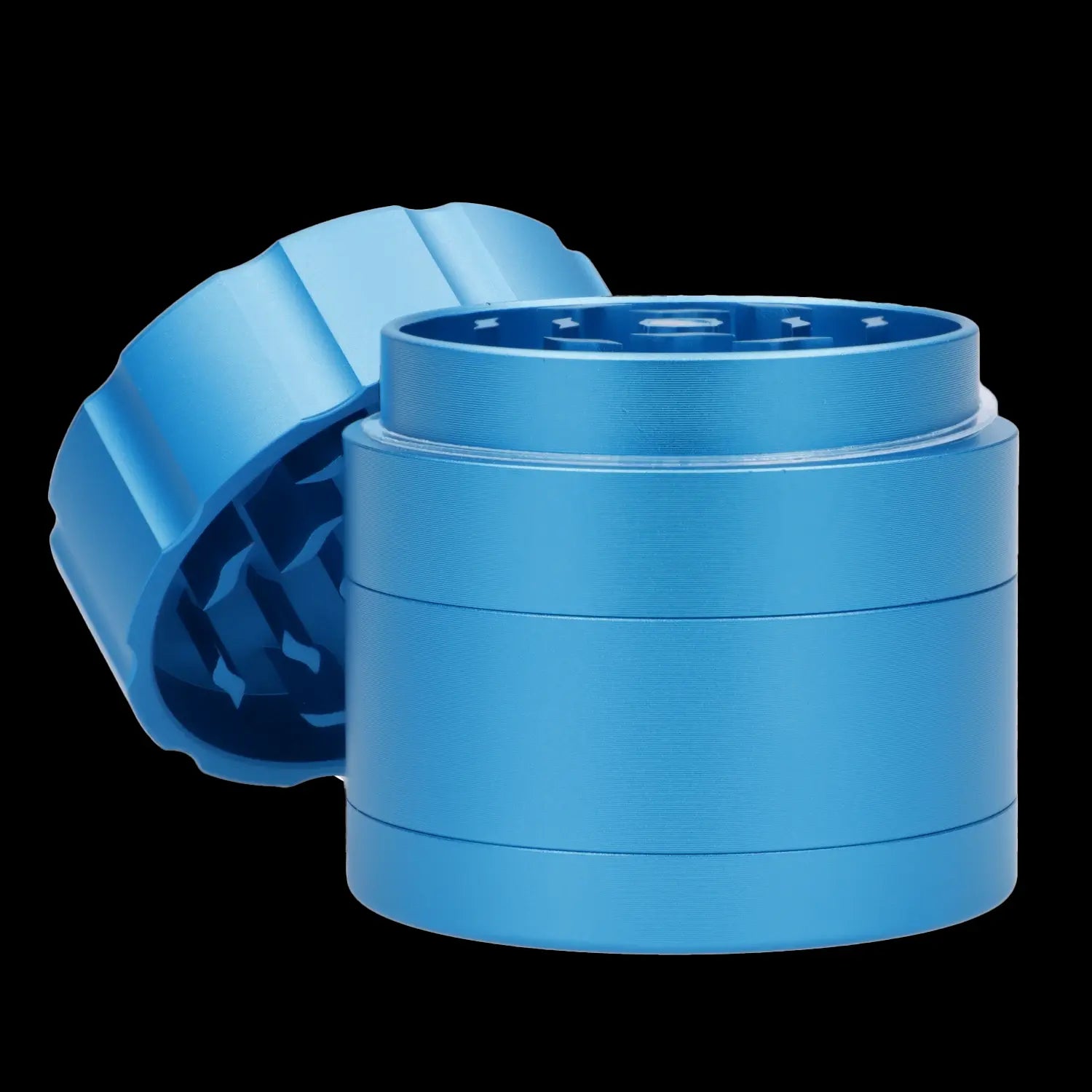 Blue four-piece cannabis grinder with lid partially detached, revealing the internal grinding teeth.