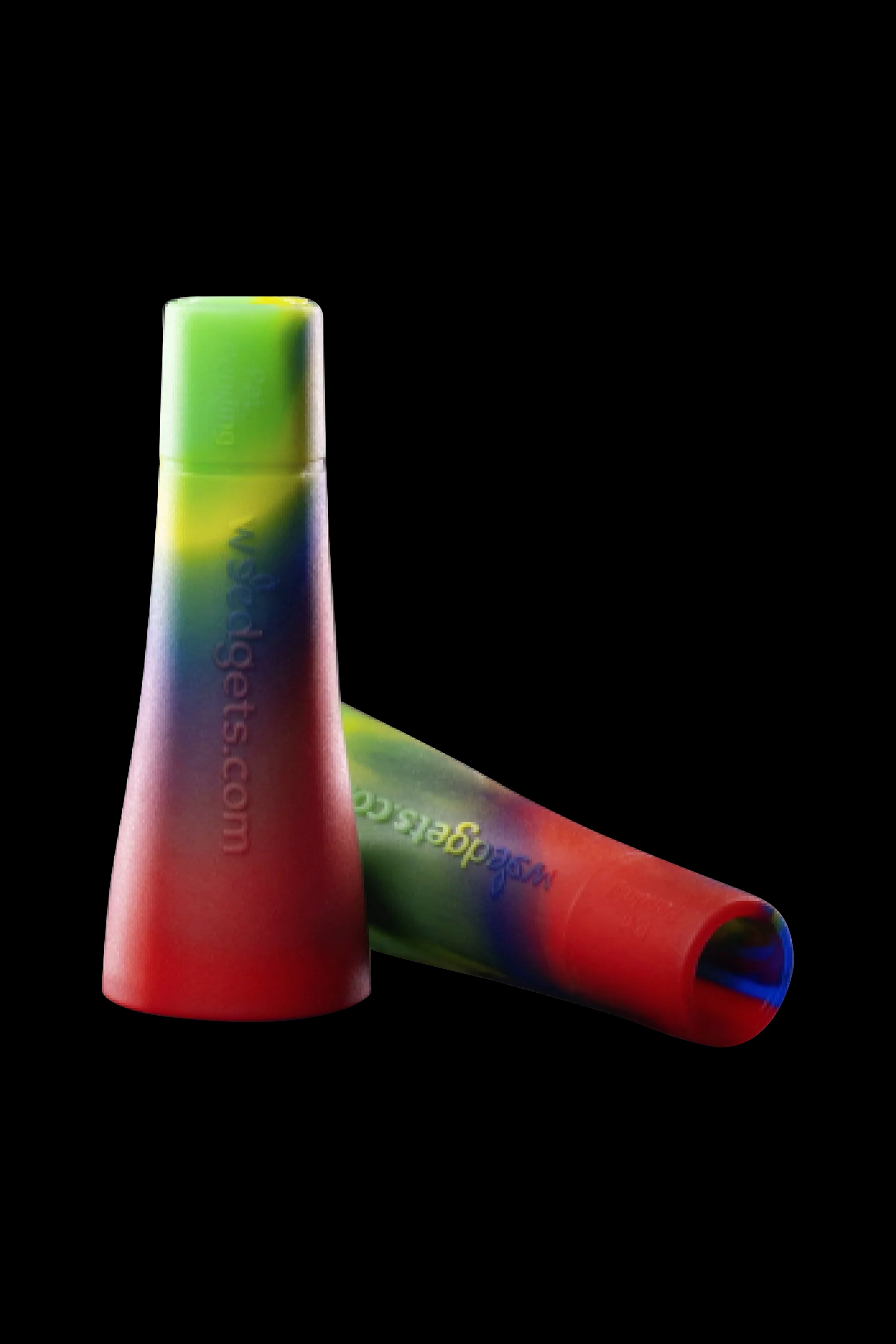 Colorful silicone dab tool with website branding against a black background.