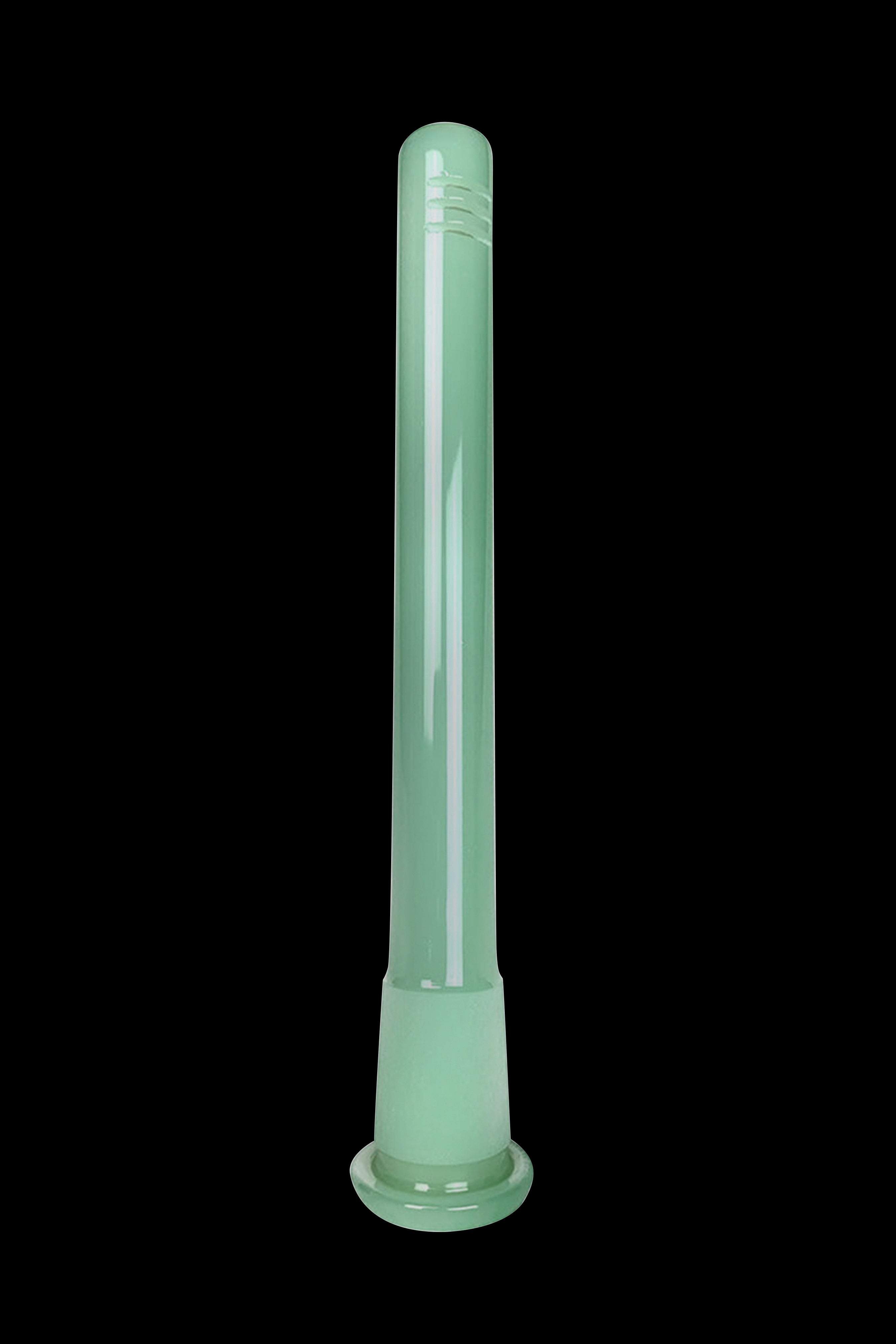 Green glass bong isolated on a black background.
