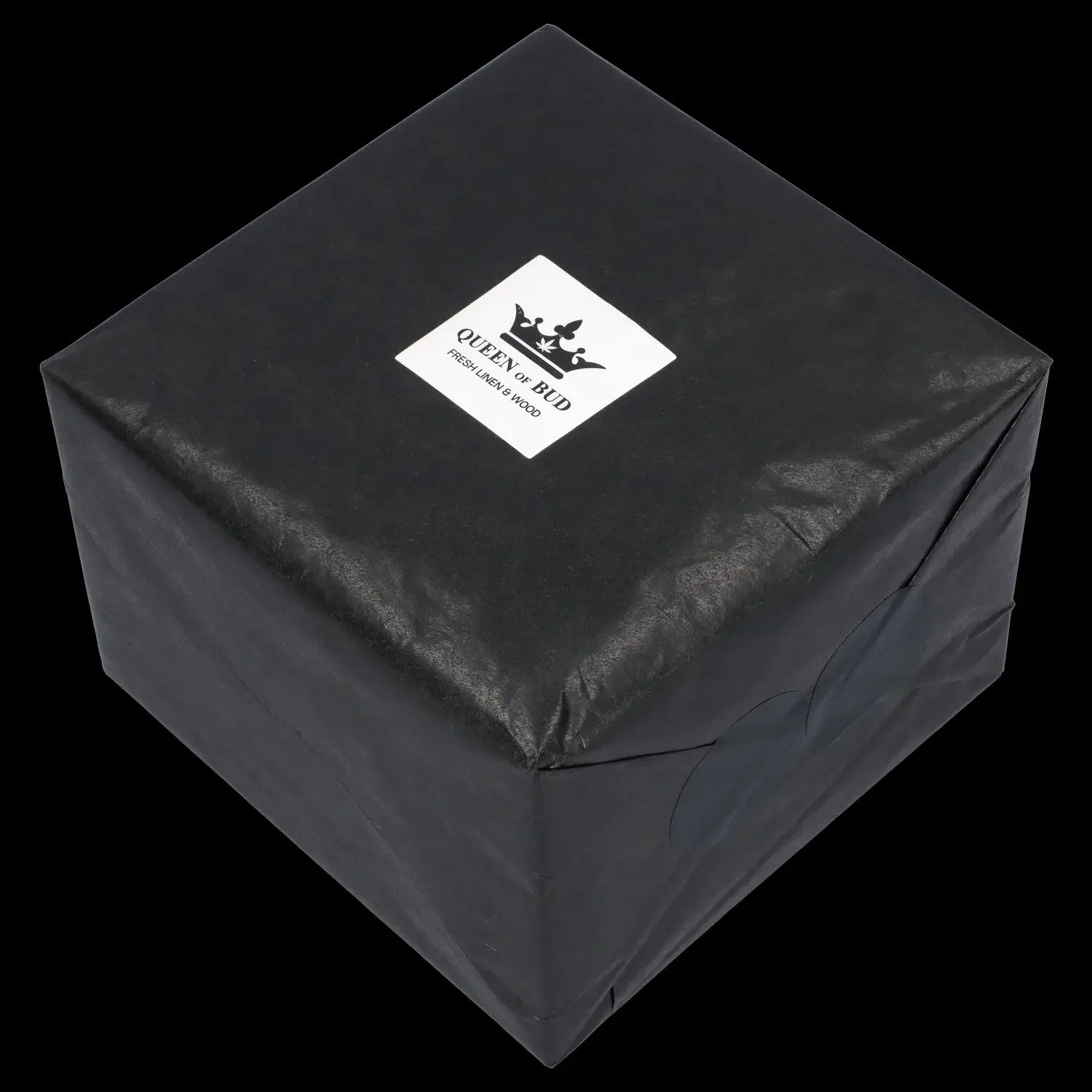 Black gift box with “Queen of Bud” logo, suggesting cannabis accessories inside.