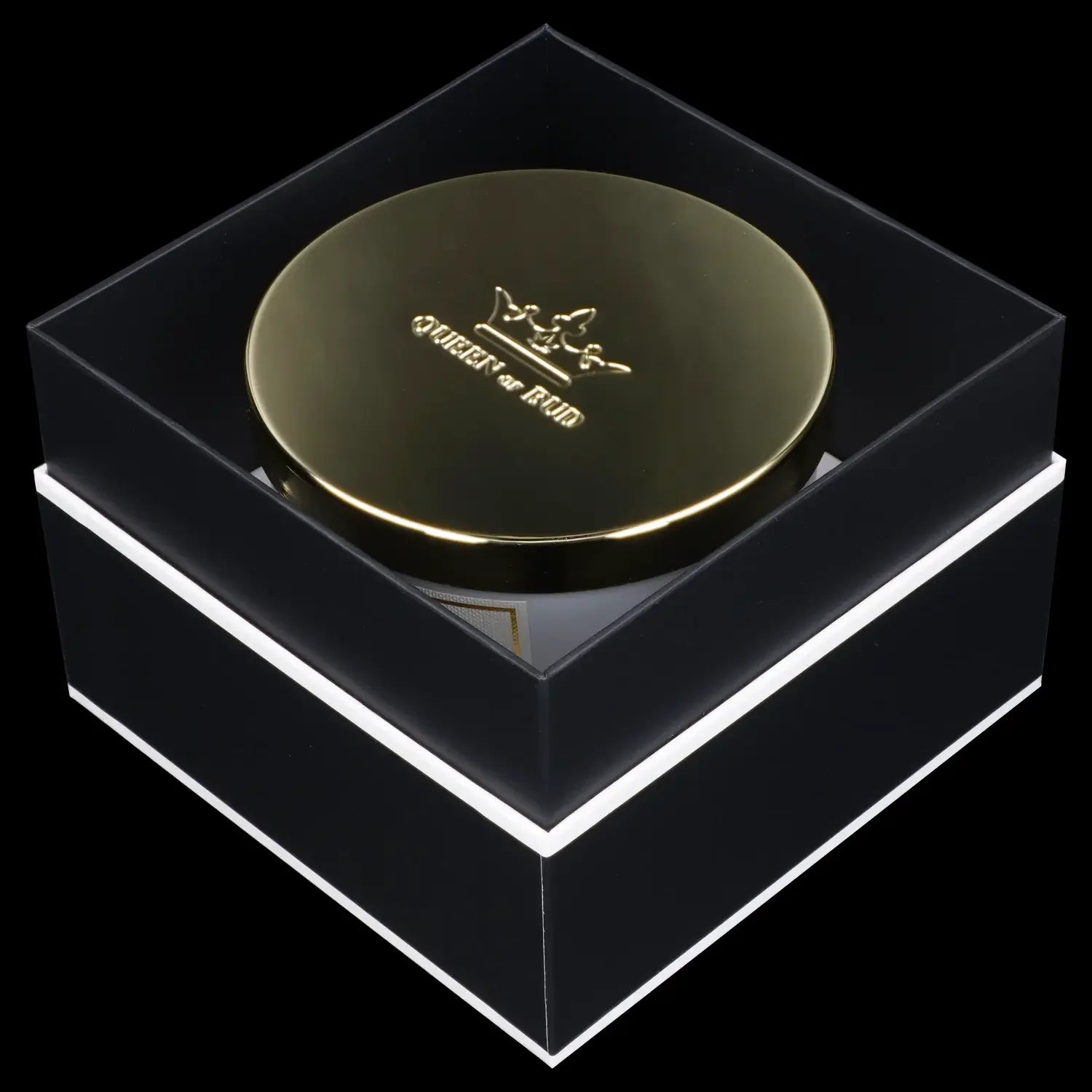 Black and gold cannabis storage jar with “Queen of Bud” logo, presented in a matching black box with white trim.