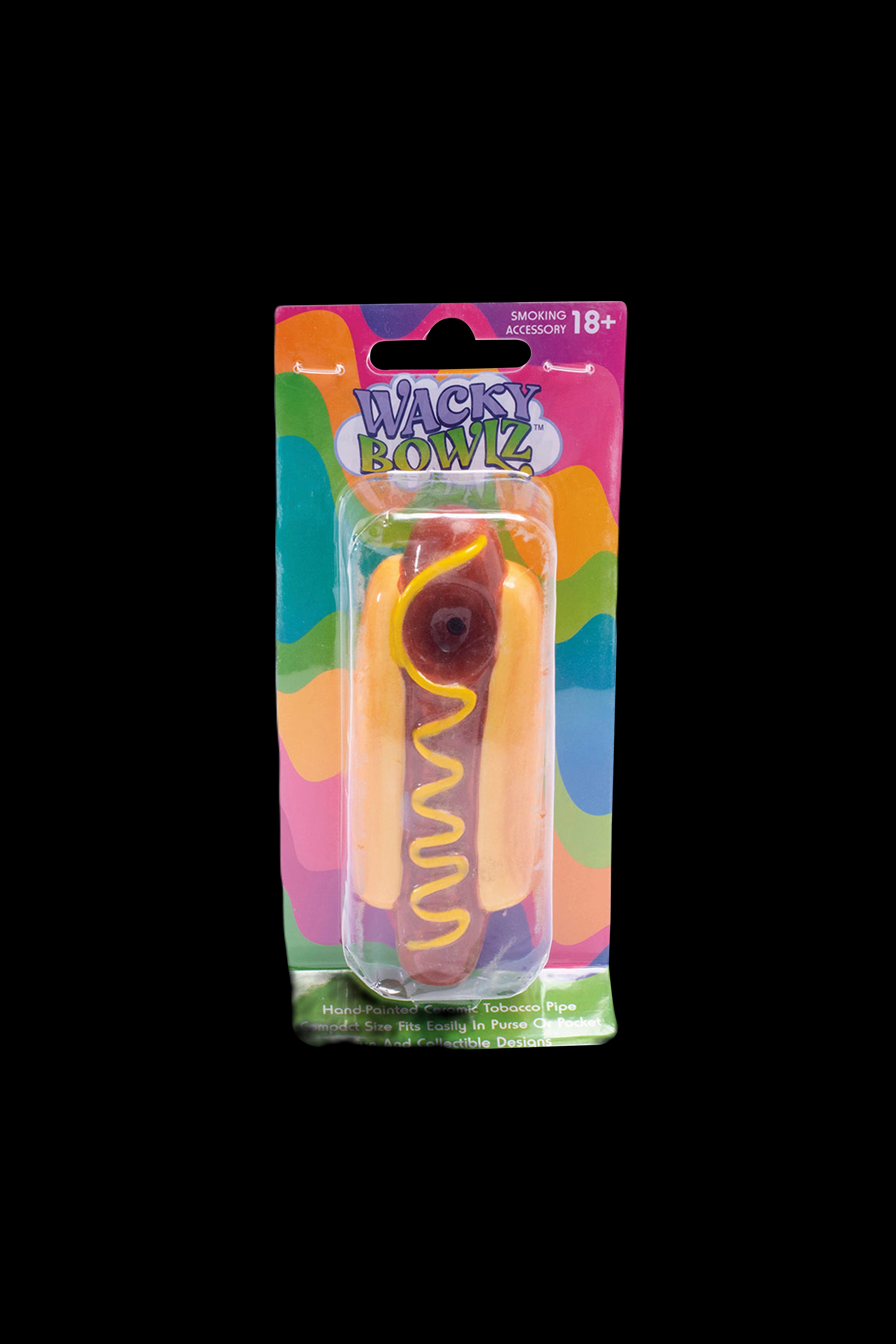 A packaged glass smoking pipe with a colorful, swirling design, labeled "Wacky Bowlz" and marked "Smoking Accessory 18+".