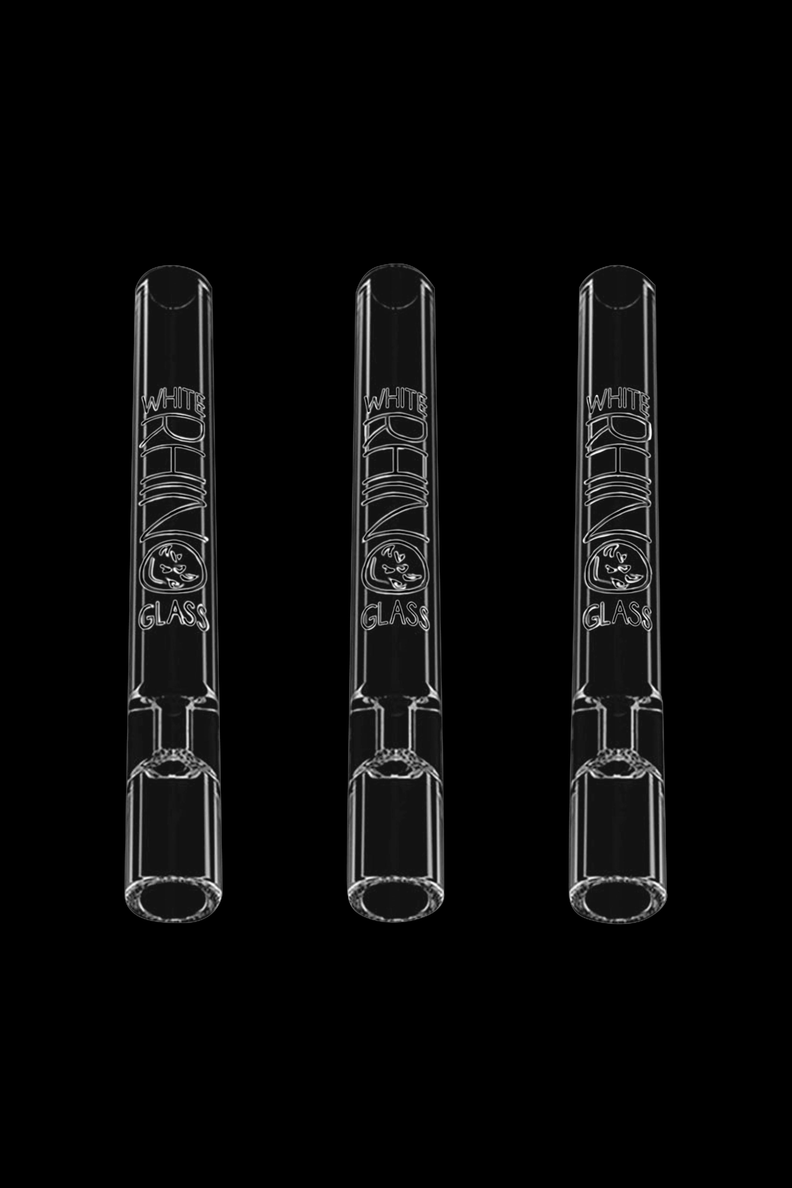 Three glass one-hitters with etched branding against a black background.