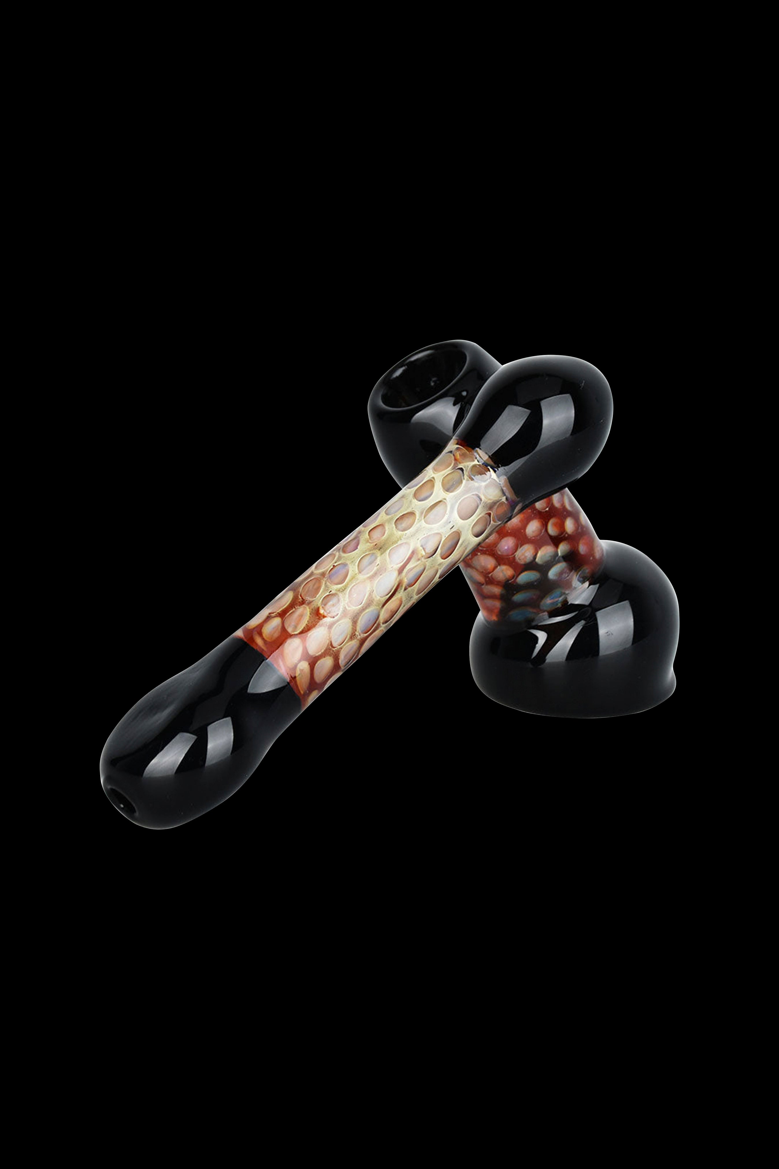 Glass cannabis pipe with intricate red and beige patterned center section, isolated on a black background.