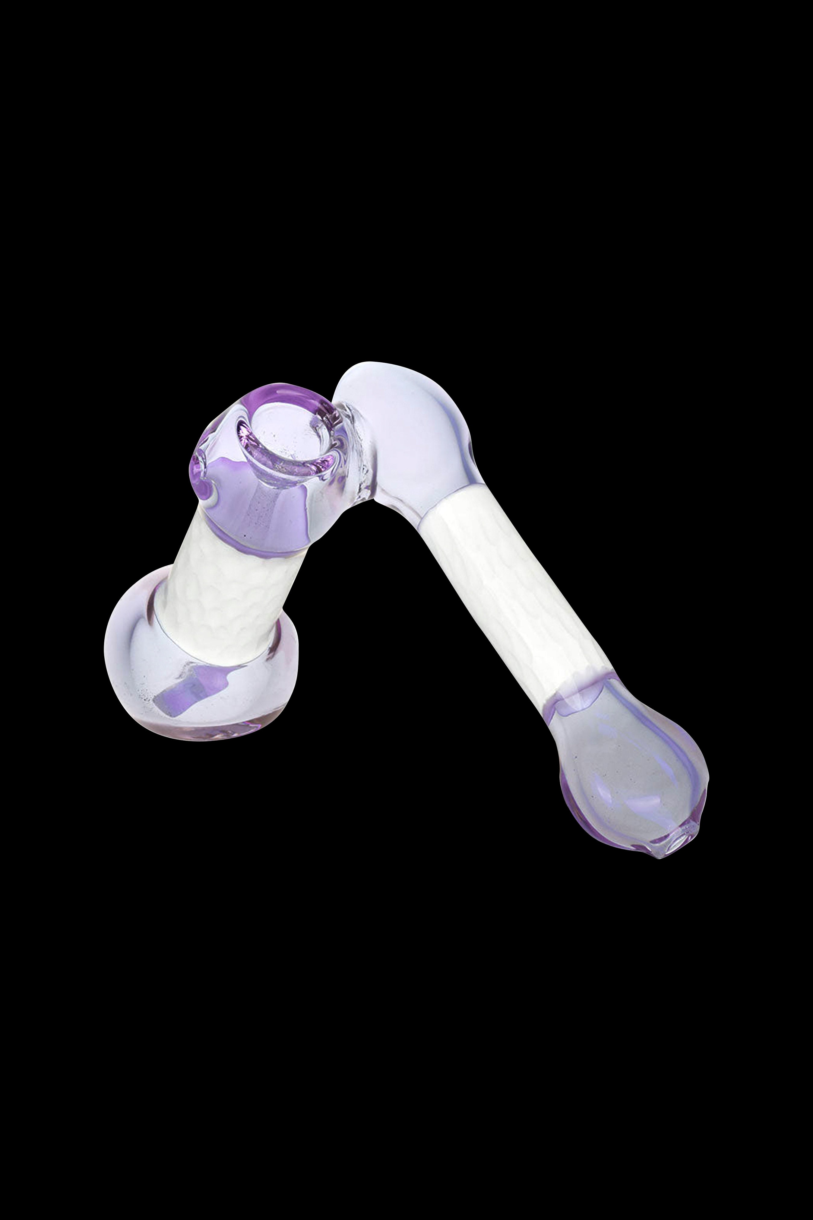 Purple glass bubbler pipe for smoking cannabis.