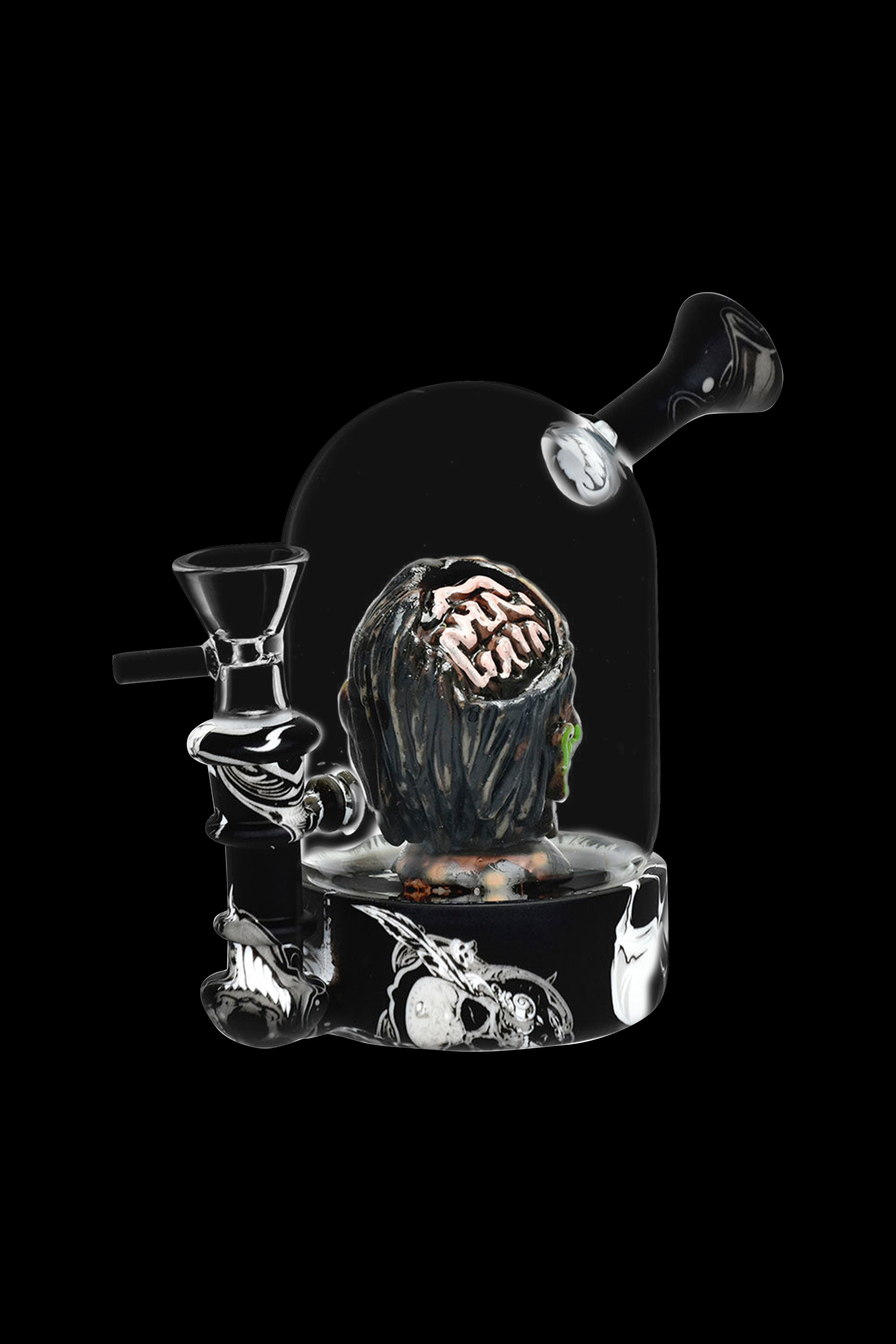 Glass cannabis water pipe shaped like a skull encased in a dome, with intricate details and a dark, moody aesthetic.