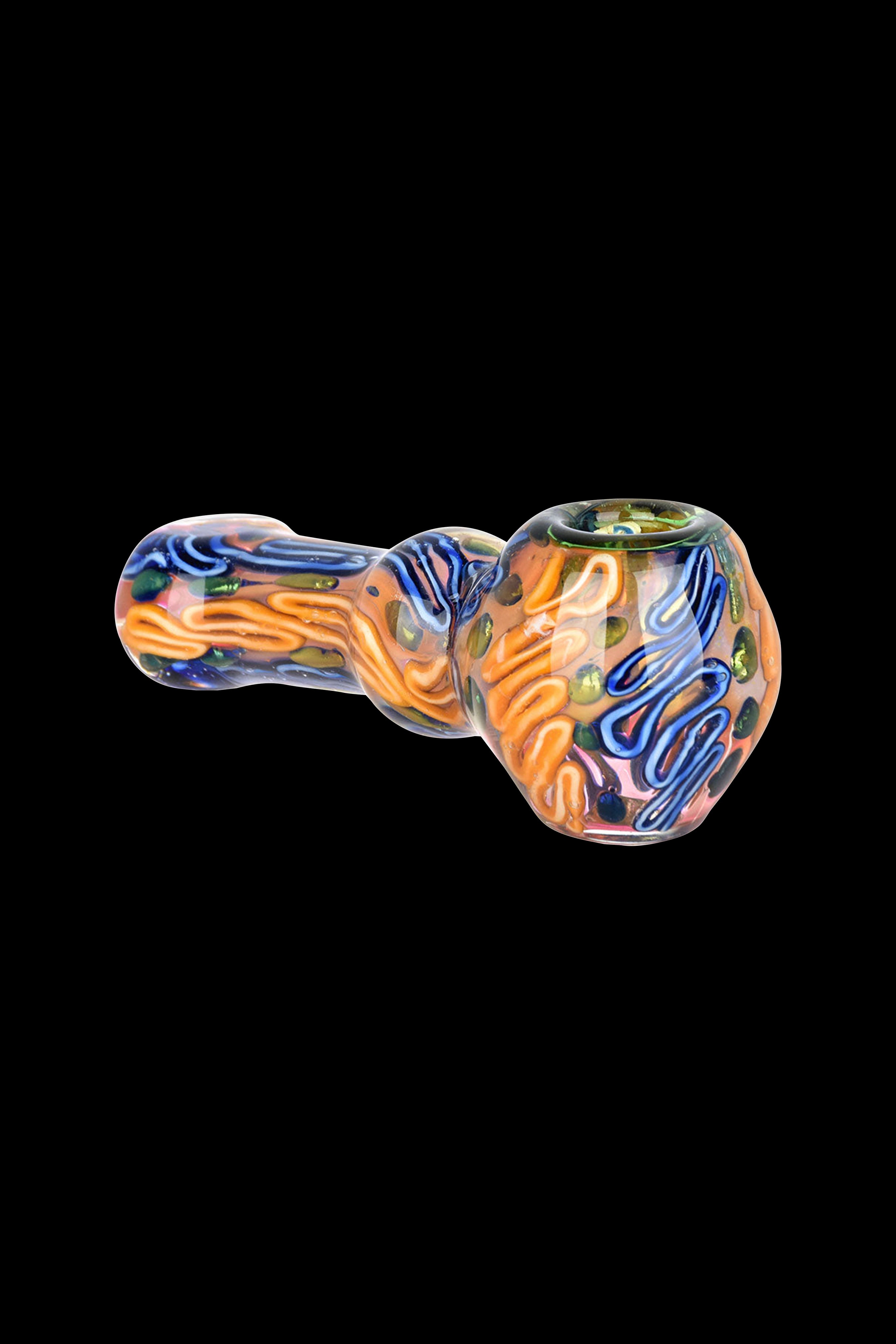 Hand-blown glass pipe with swirling orange, blue, and yellow patterns.