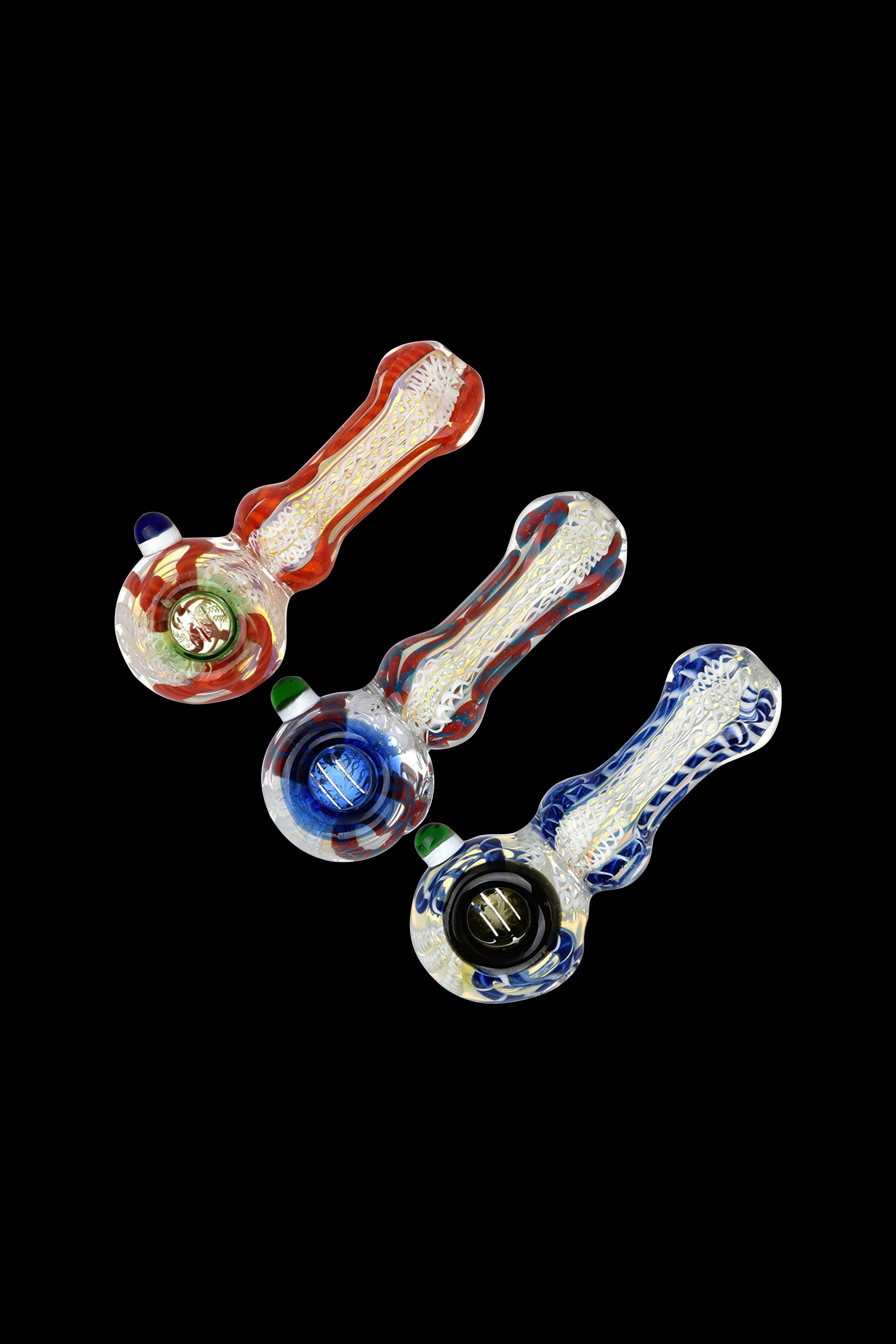 Colorful glass pipes for smoking cannabis displayed against a black background.