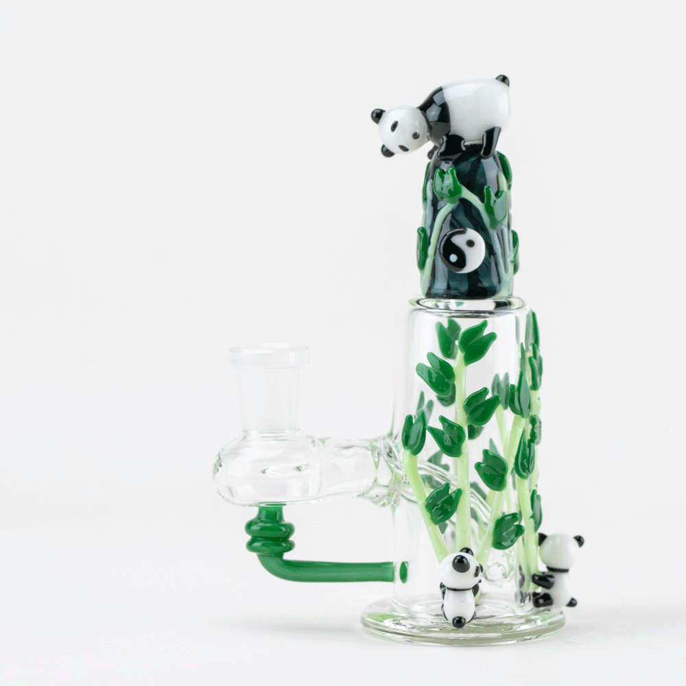 Empire Glassworks Panda Fam Nano Rig: Hand-blown glass rig featuring sculpted panda faces & colorful detailing. A miniature collectible art piece.