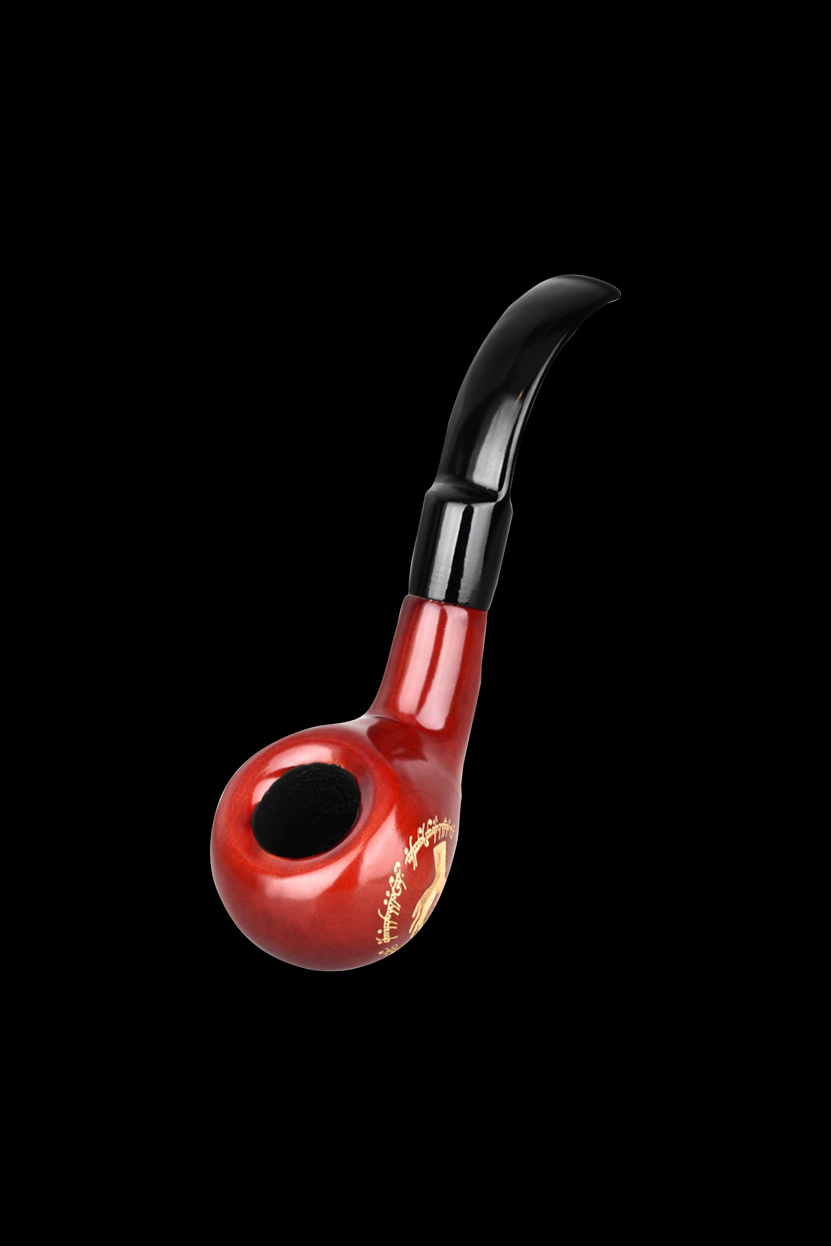 Red glass pipe with black accents against a black background.