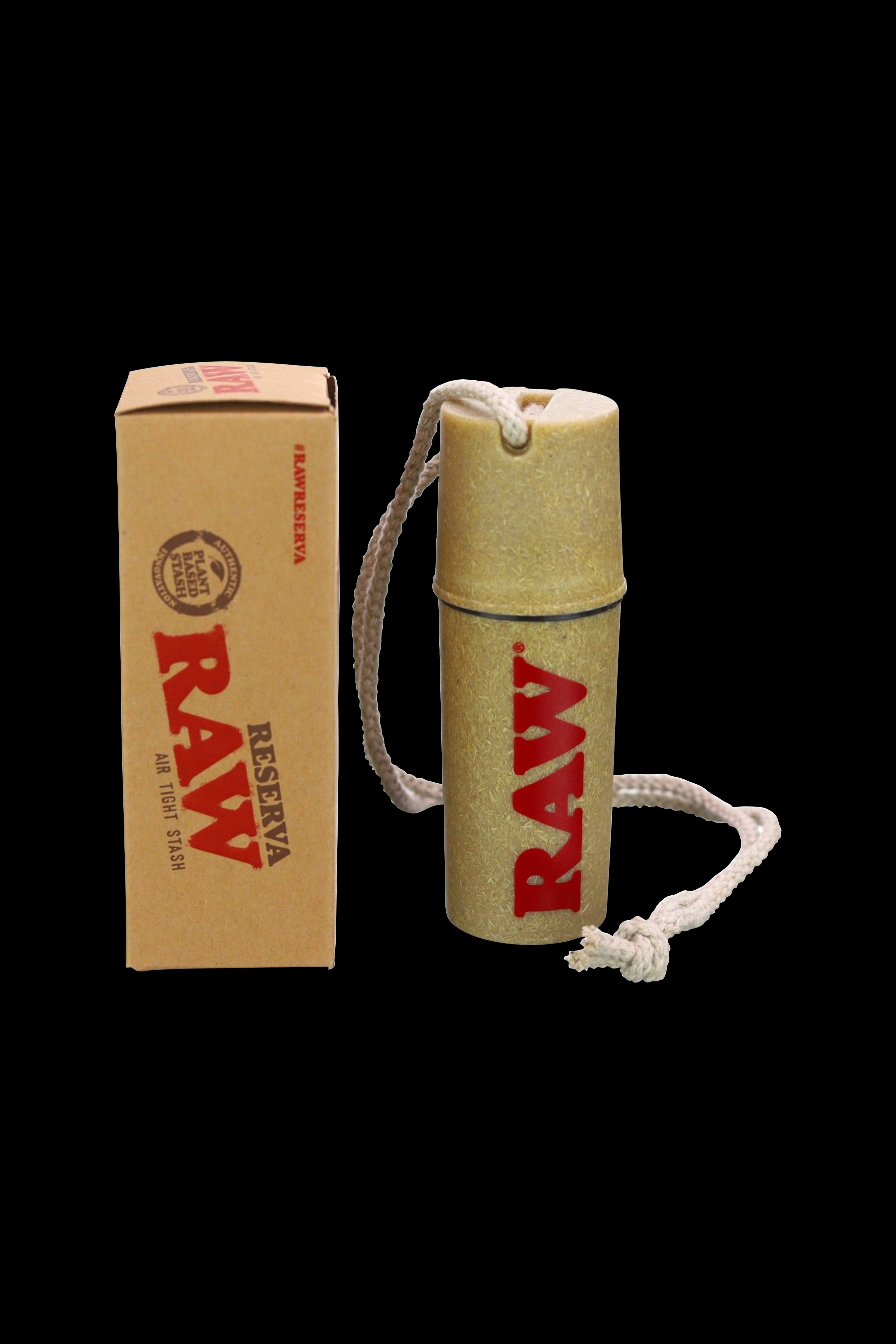 A brown, cylindrical Raw Reserva air-tight stash container with a rope loop and visible branding.