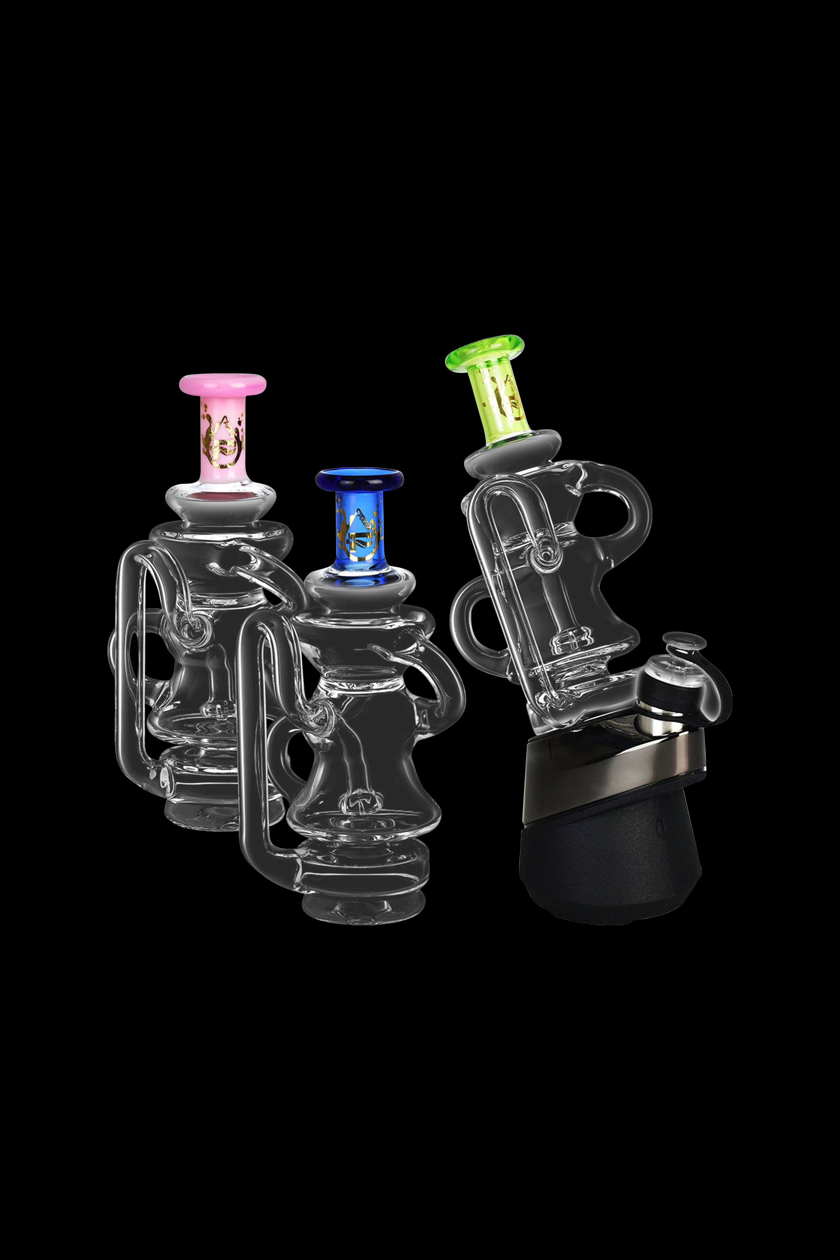 Glass dab rigs with colorful accents, studio shot on black background.
