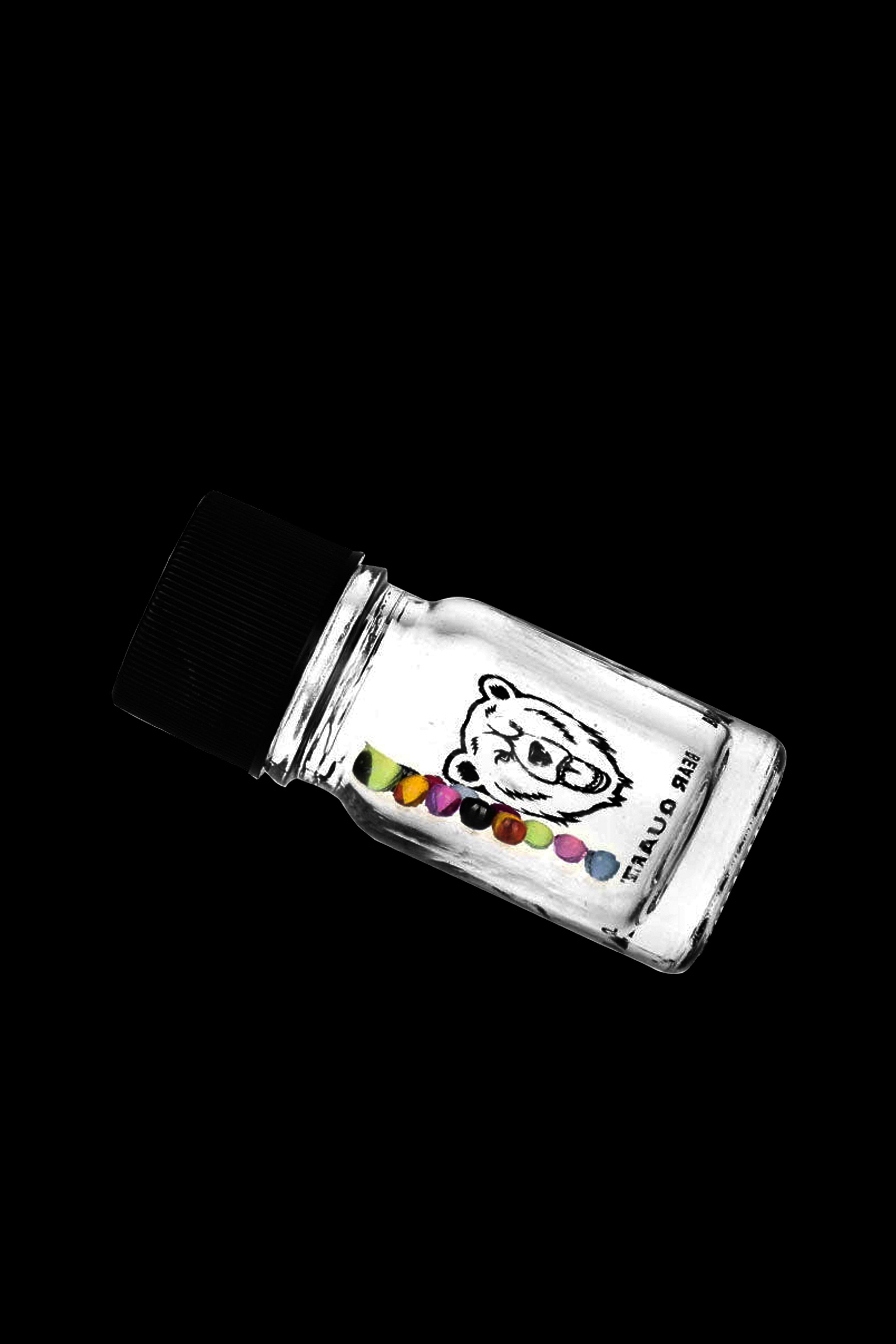 Glass jar with colorful cannabis buds inside, labeled with a bear illustration.