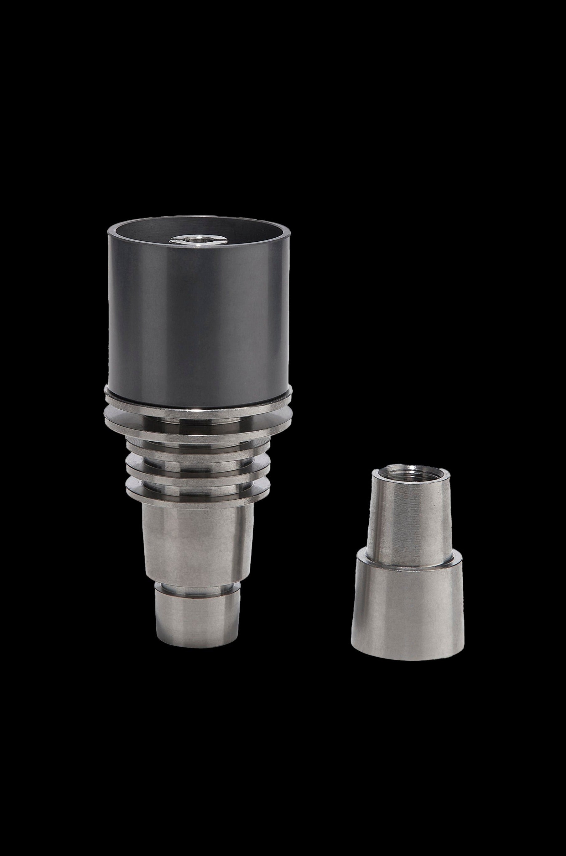 Two metal dab nails for vaporizing cannabis concentrates, isolated on a black background.