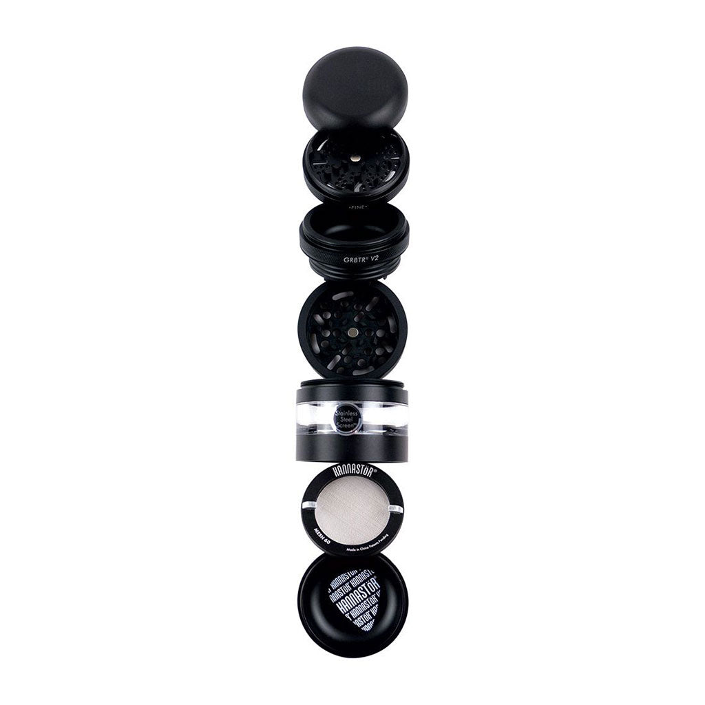 Top-down exploded view of the Matte Silver RYOT GR8TR Jar Body Grinder showing each separated black and clear chamber and mesh screen.