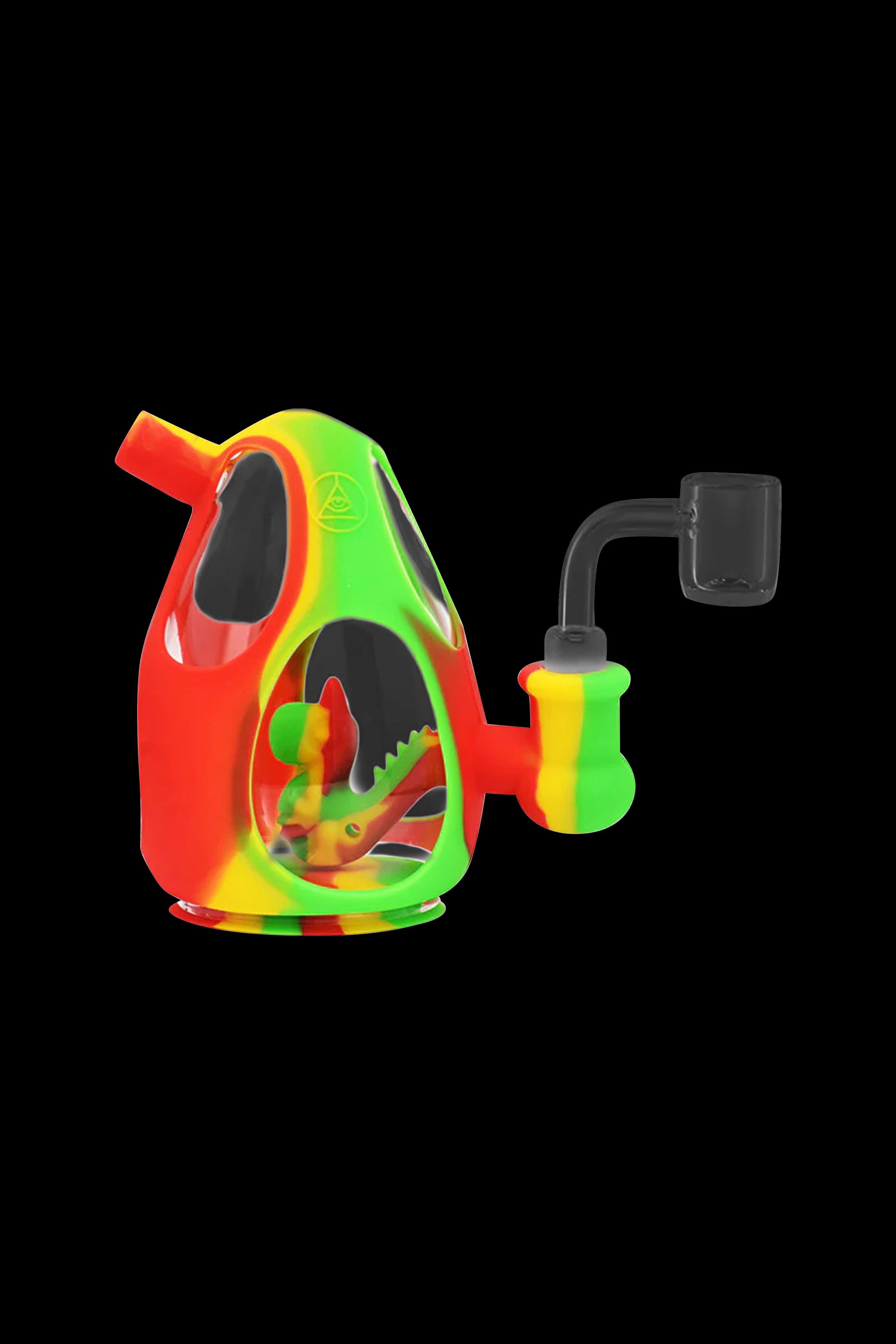 Colorful silicone water pipe (rig) with a dinosaur-shaped chamber and accompanying quartz banger.