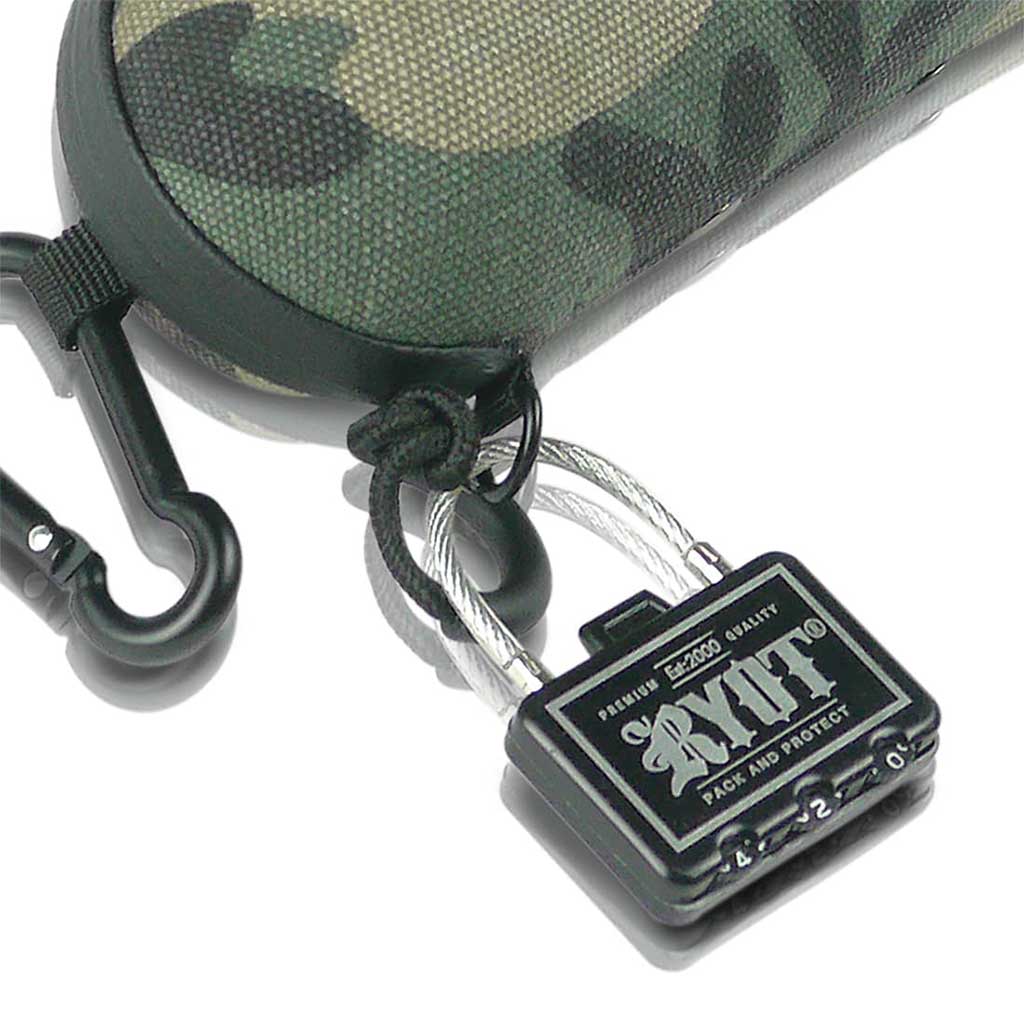 Close-up angled view of a camo fabric RYOT Hardcase showing its zipper pull, carabiner clip, and attached small combination lock.