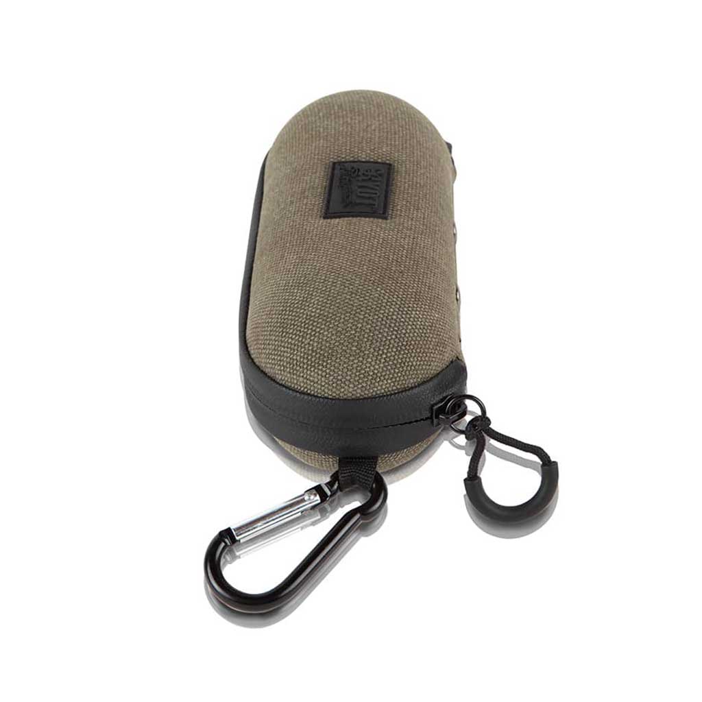 Top-down view of a khaki fabric and black-trim RYOT Hardcase with zipper pulls and attached black carabiner.