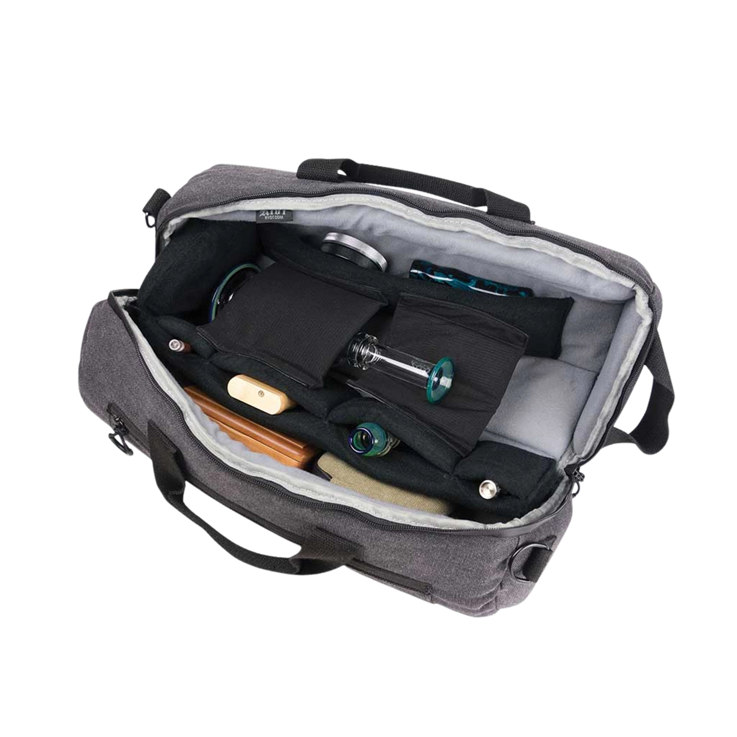 Top-down view of the open RYOT Pro-Duffle Carbon Series Smell-Proof Bag showing padded black interior compartments and several glass pieces neatly arranged.