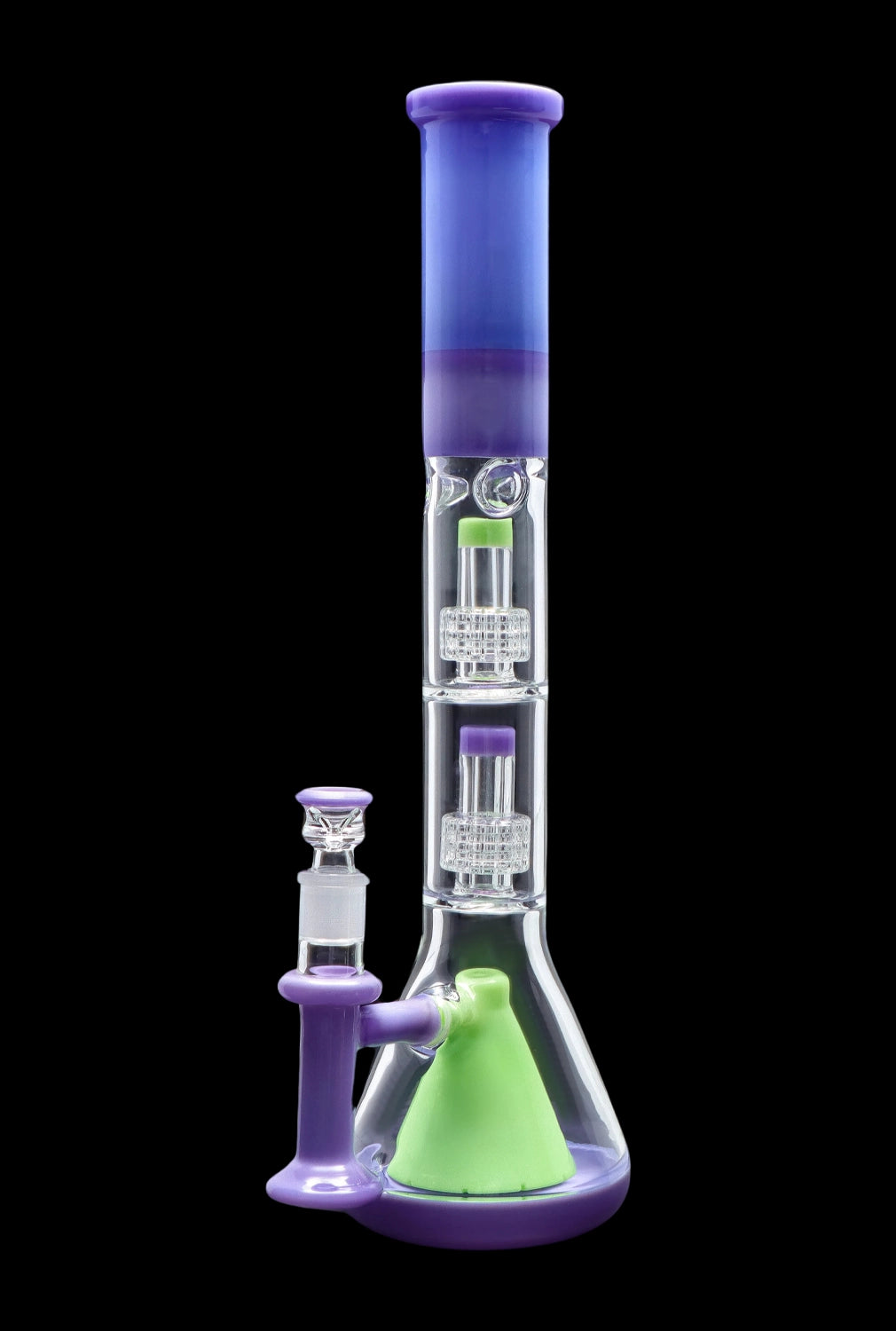 Purple and green glass bong with intricate percolators, isolated on a black background.