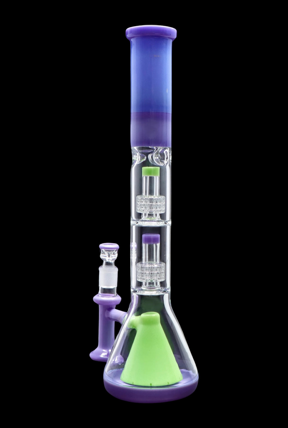 A vibrant, multi-chambered glass water pipe (bong) with purple and green accents, displayed with a separate glass piece.