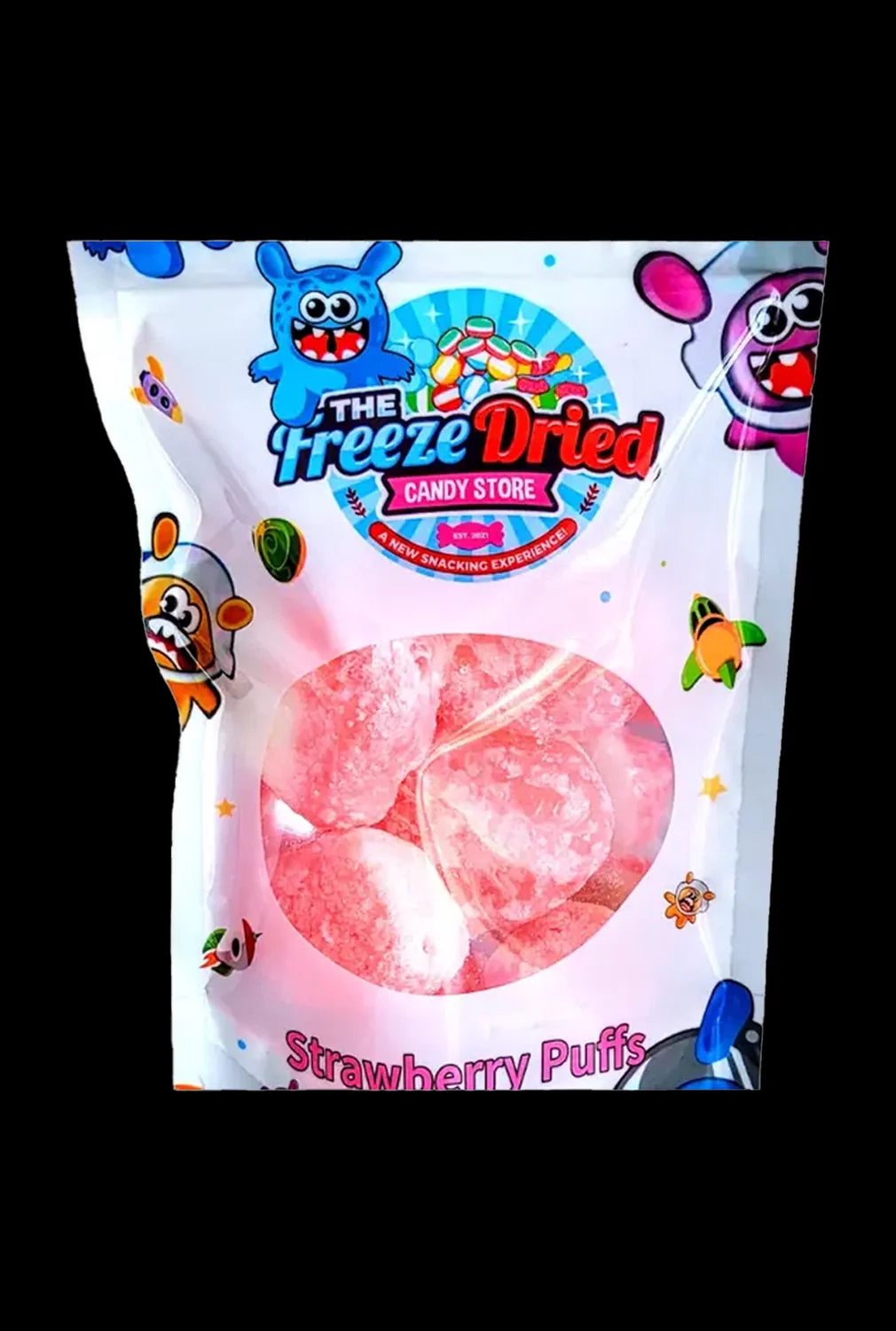 A colorful, sealed bag of “Strawberry Puffs” from “The Freeze Dried Candy Store,” featuring cartoon alien characters, likely containing cannabis-infused edible treats.