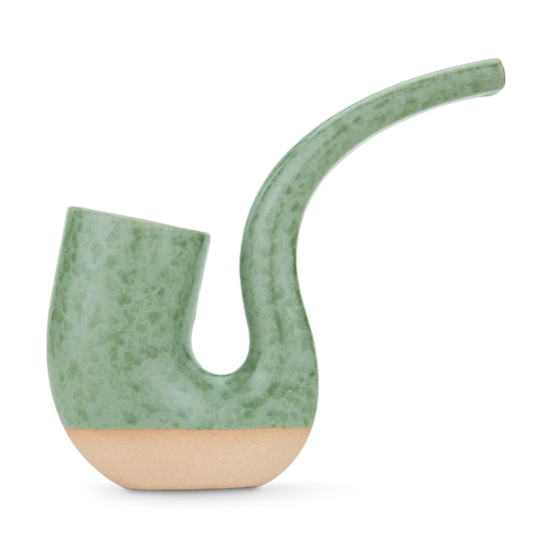 Side view of the mint-green Puffco Proxy Terrapipe with a speckled glaze and exposed clay base against a white background.