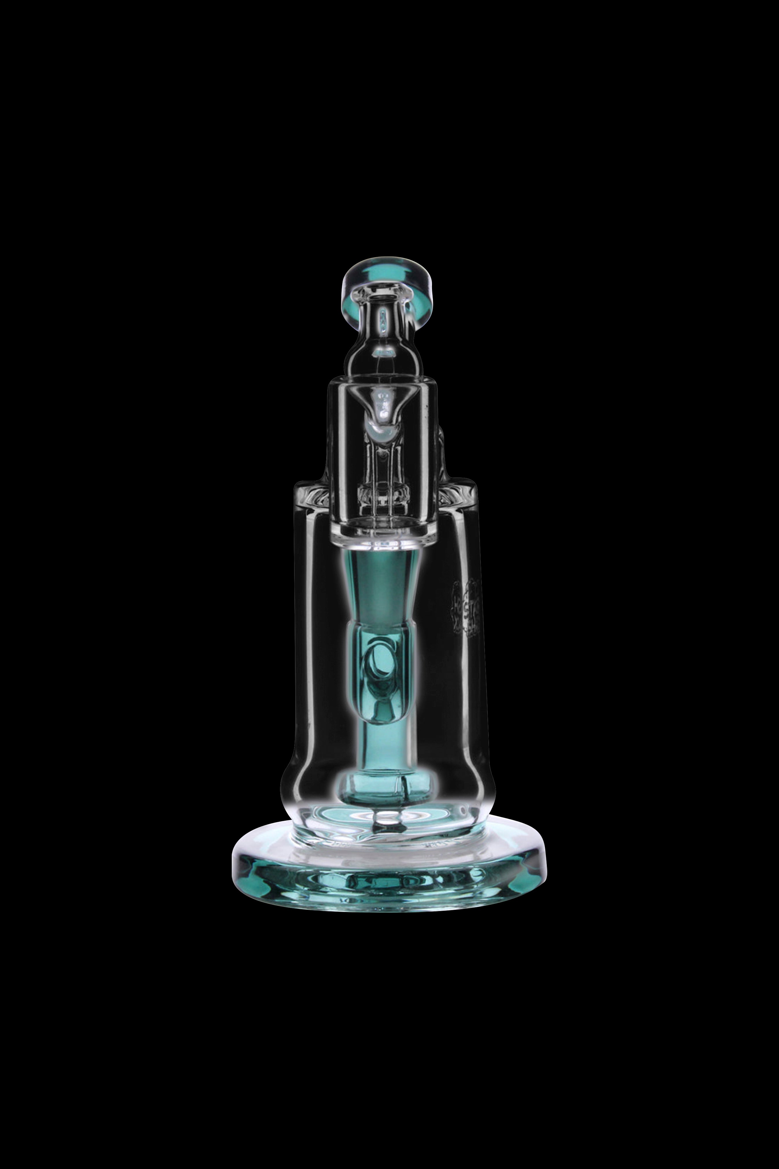 A turquoise glass rig with a bubbler and quartz insert, isolated on a black background.
