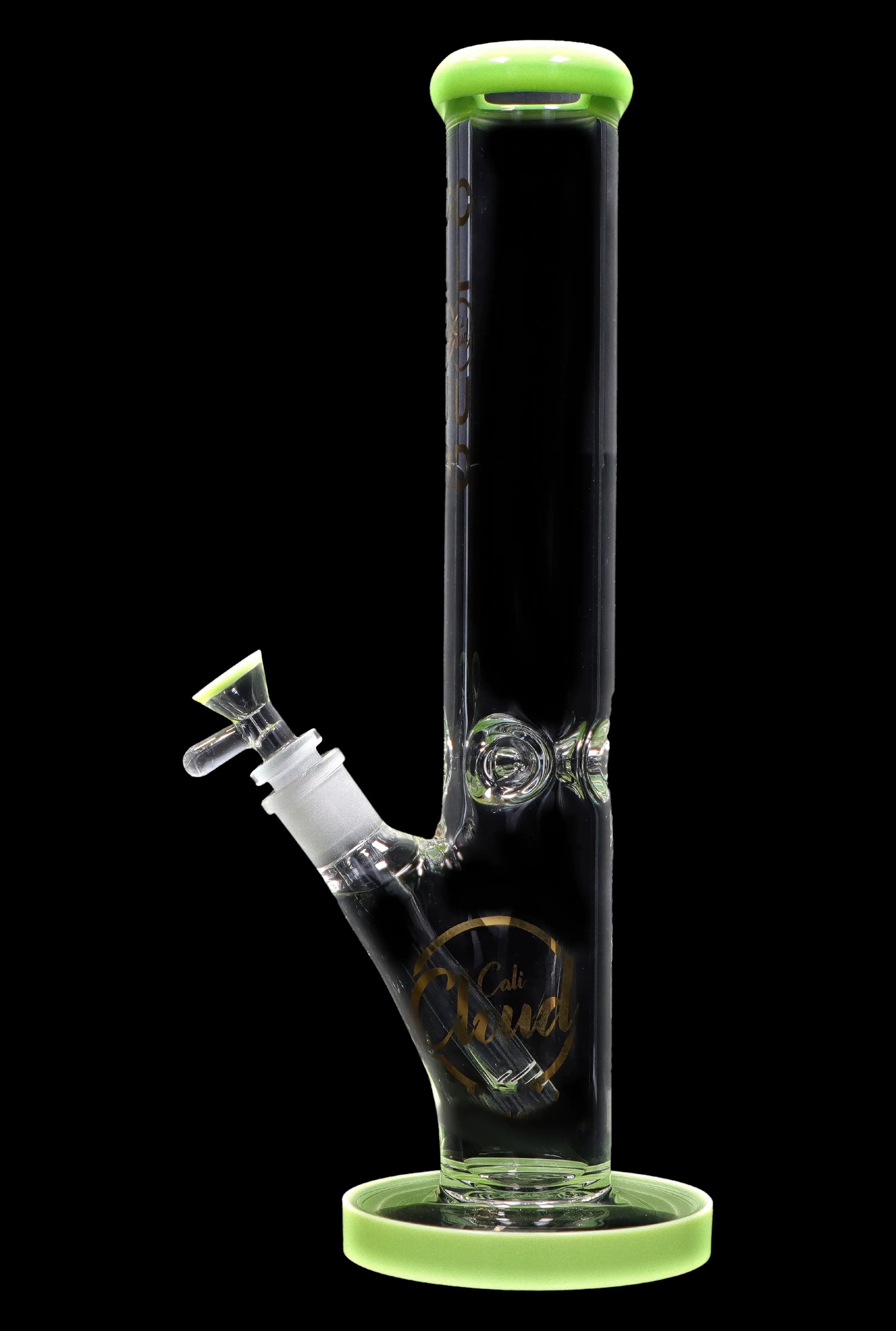 A green-accented glass bong with a clear tube and intricate etched design.