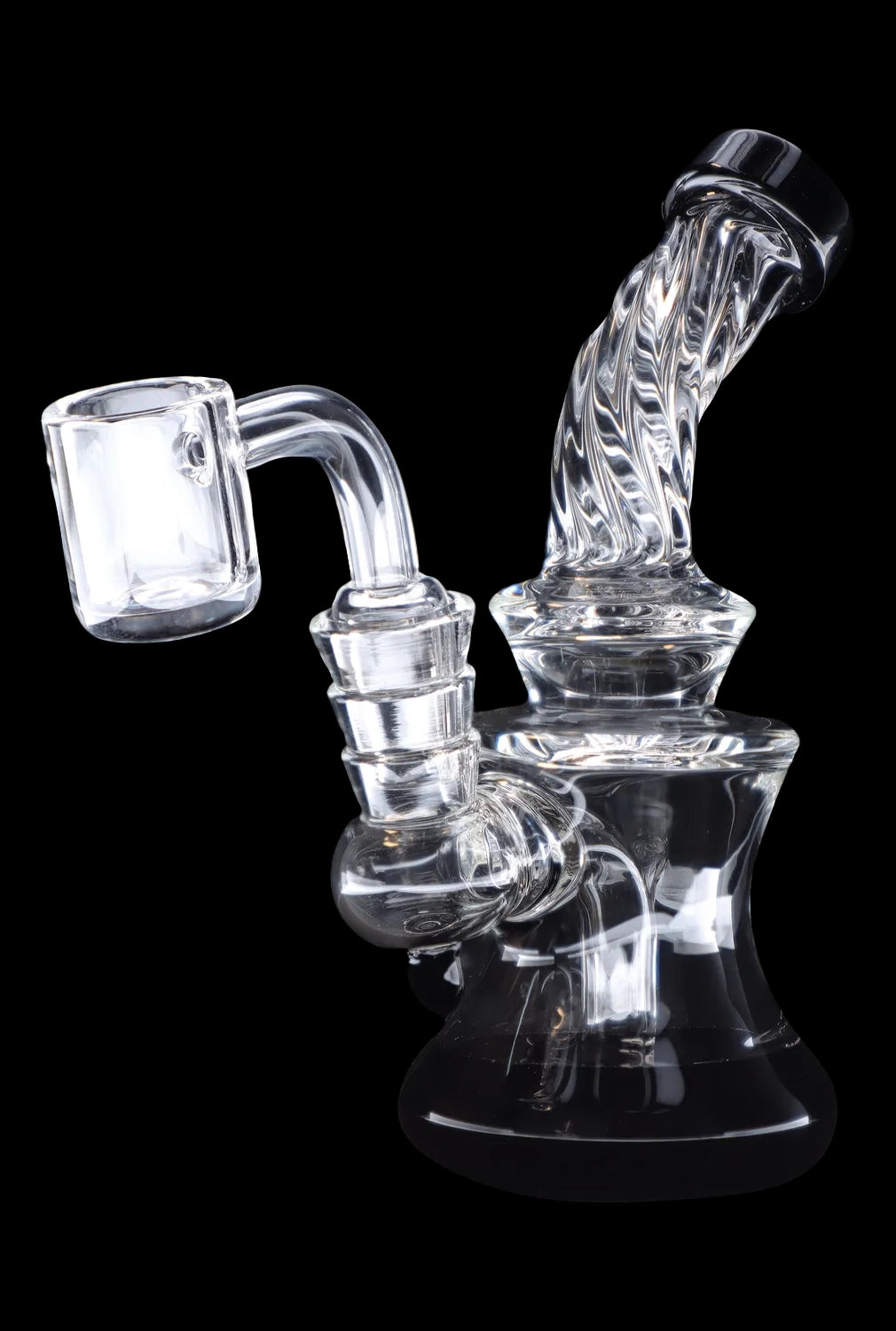 Clear glass dab rig with intricate bubbler design and quartz banger.