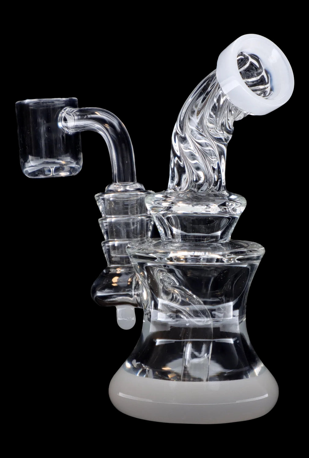 Clear glass dab rig with quartz banger, isolated on a black background.