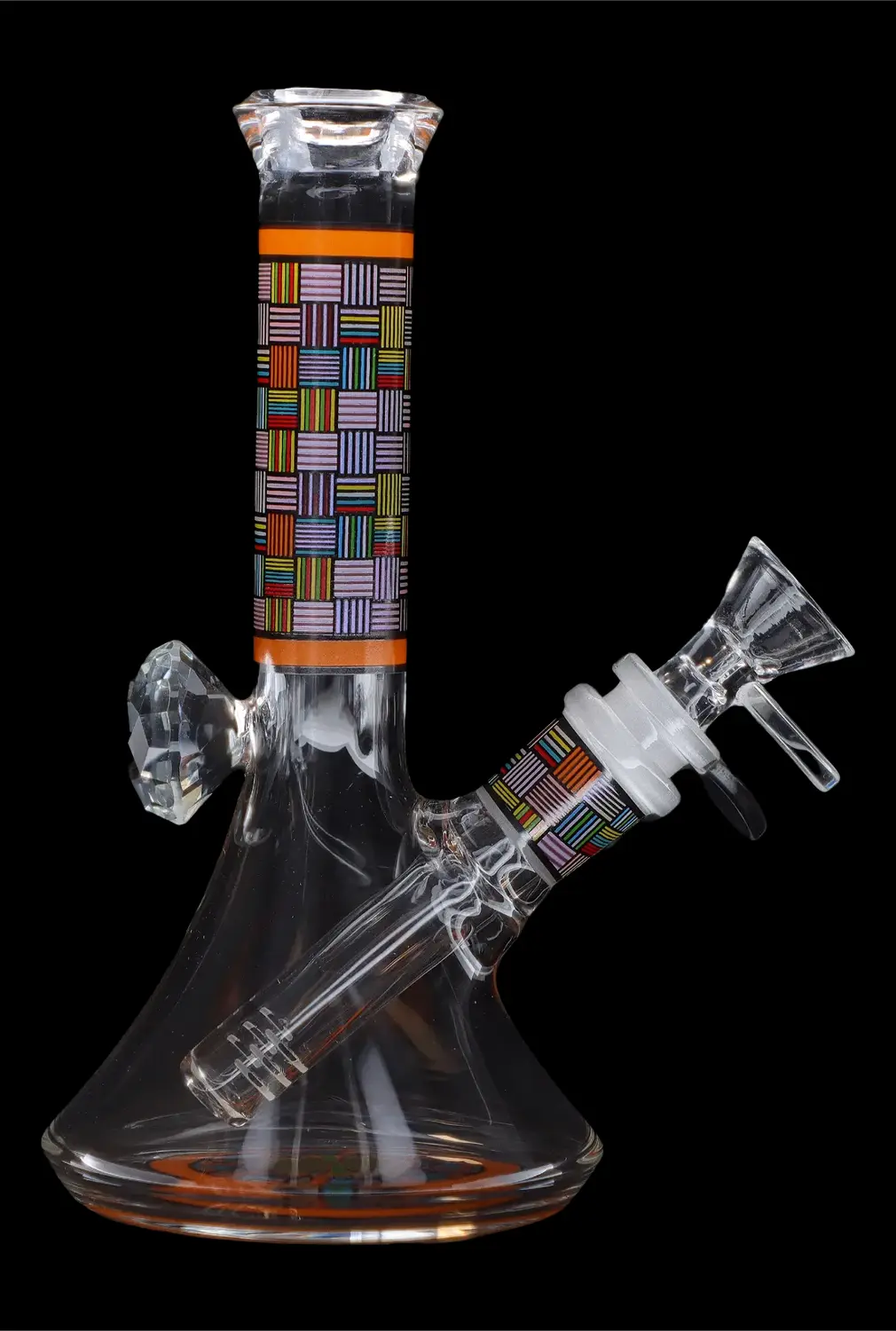 Glass water pipe (bong) with colorful geometric pattern, isolated on black.