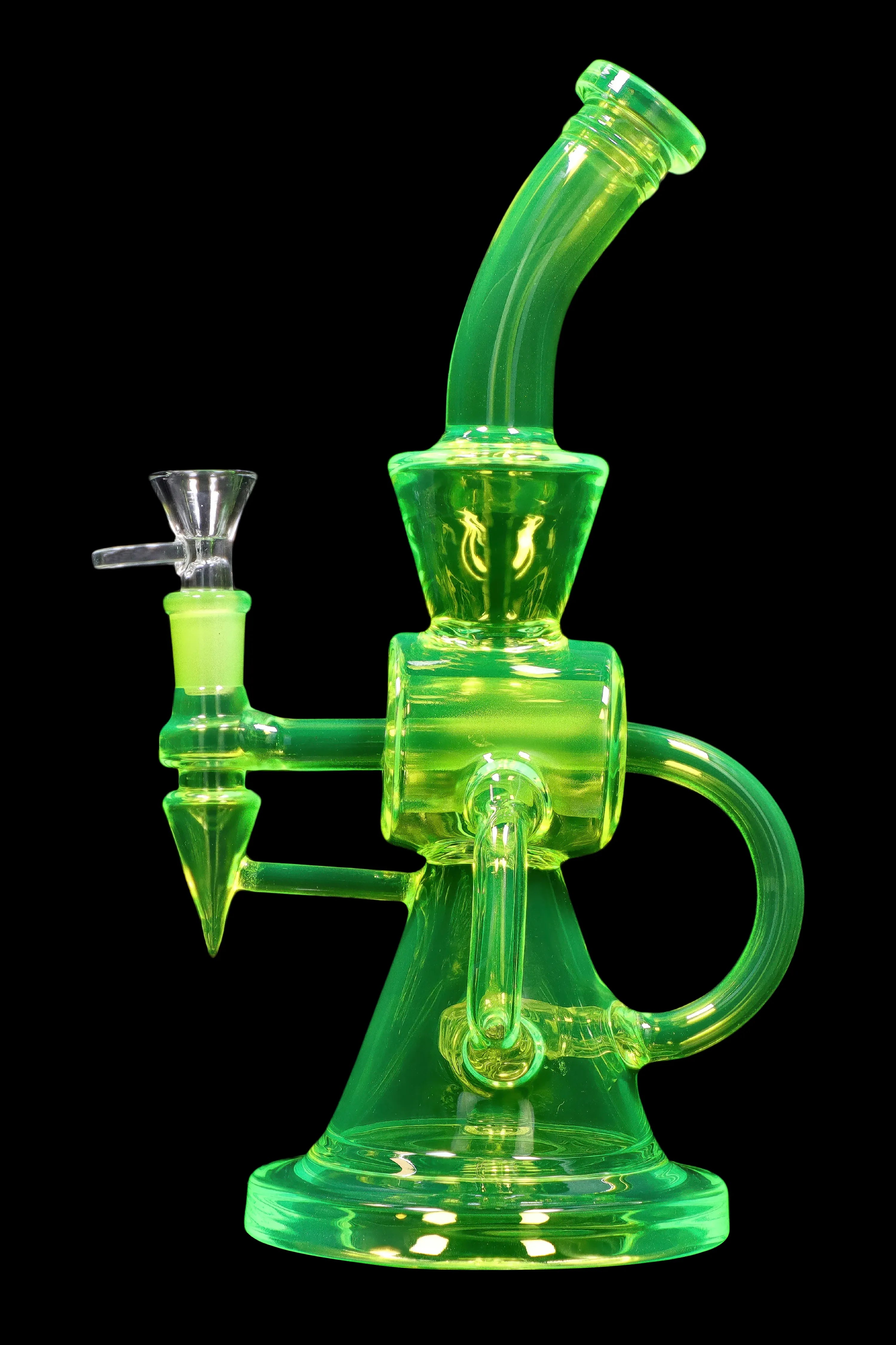 Green glass water pipe (rig) with intricate bubbler design, isolated on black.