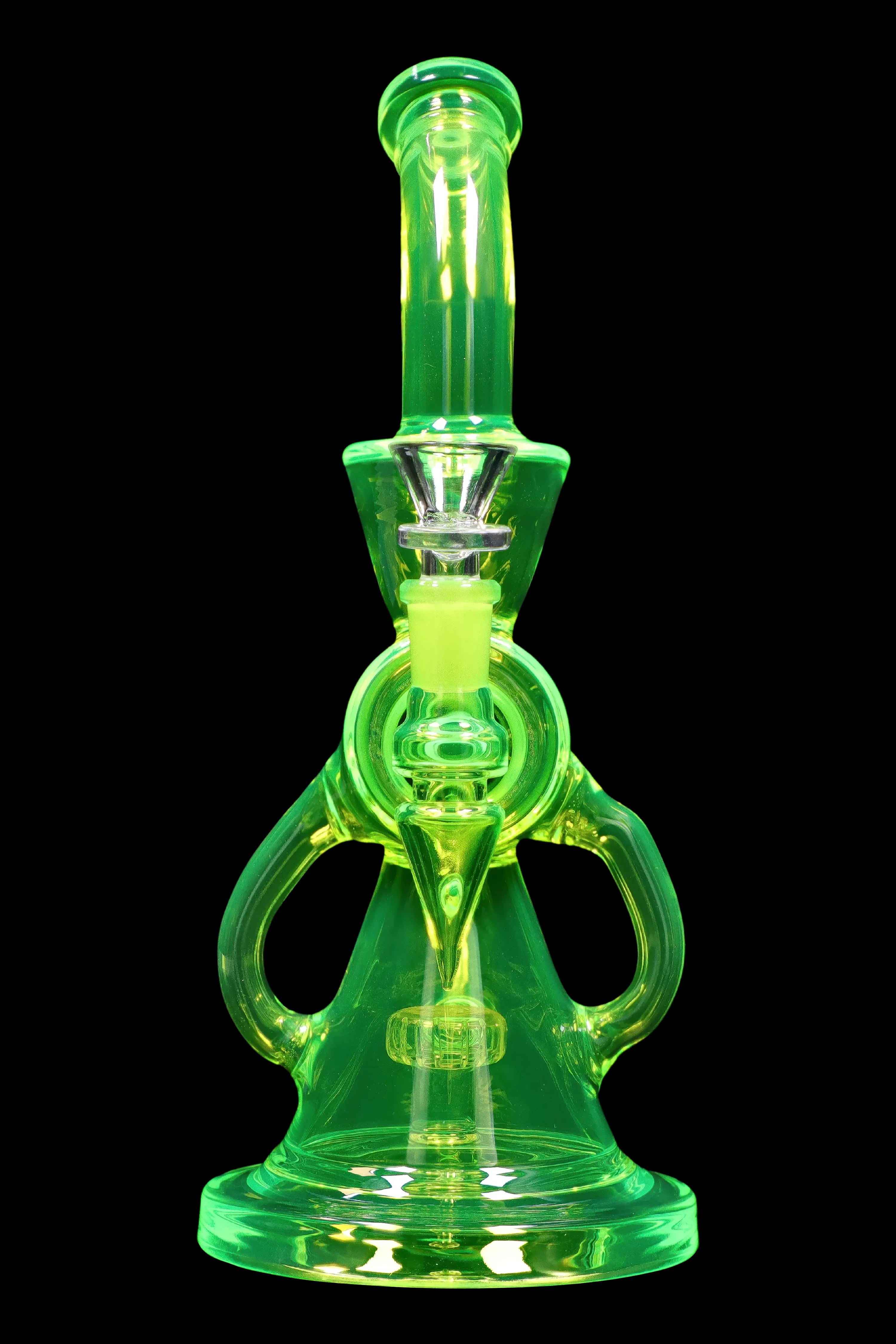 Green glass dab rig with intricate curves and percolators, isolated on a black background.