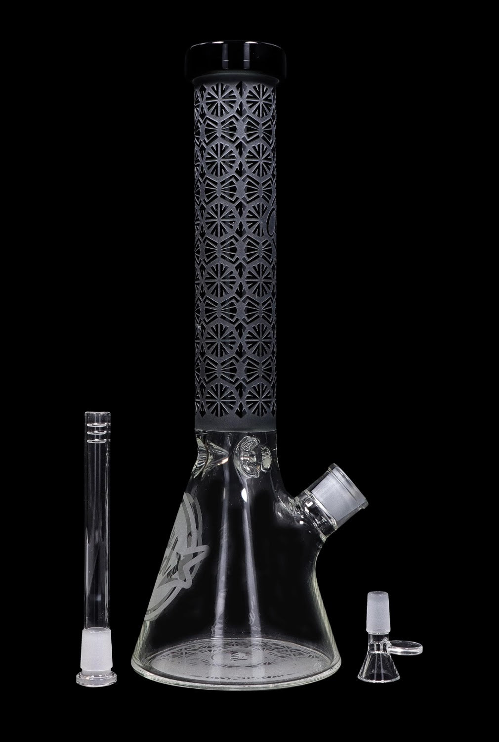 Clear glass water pipe (bong) with intricate geometric patterns and accompanying downstem and bowl, isolated on a black background.