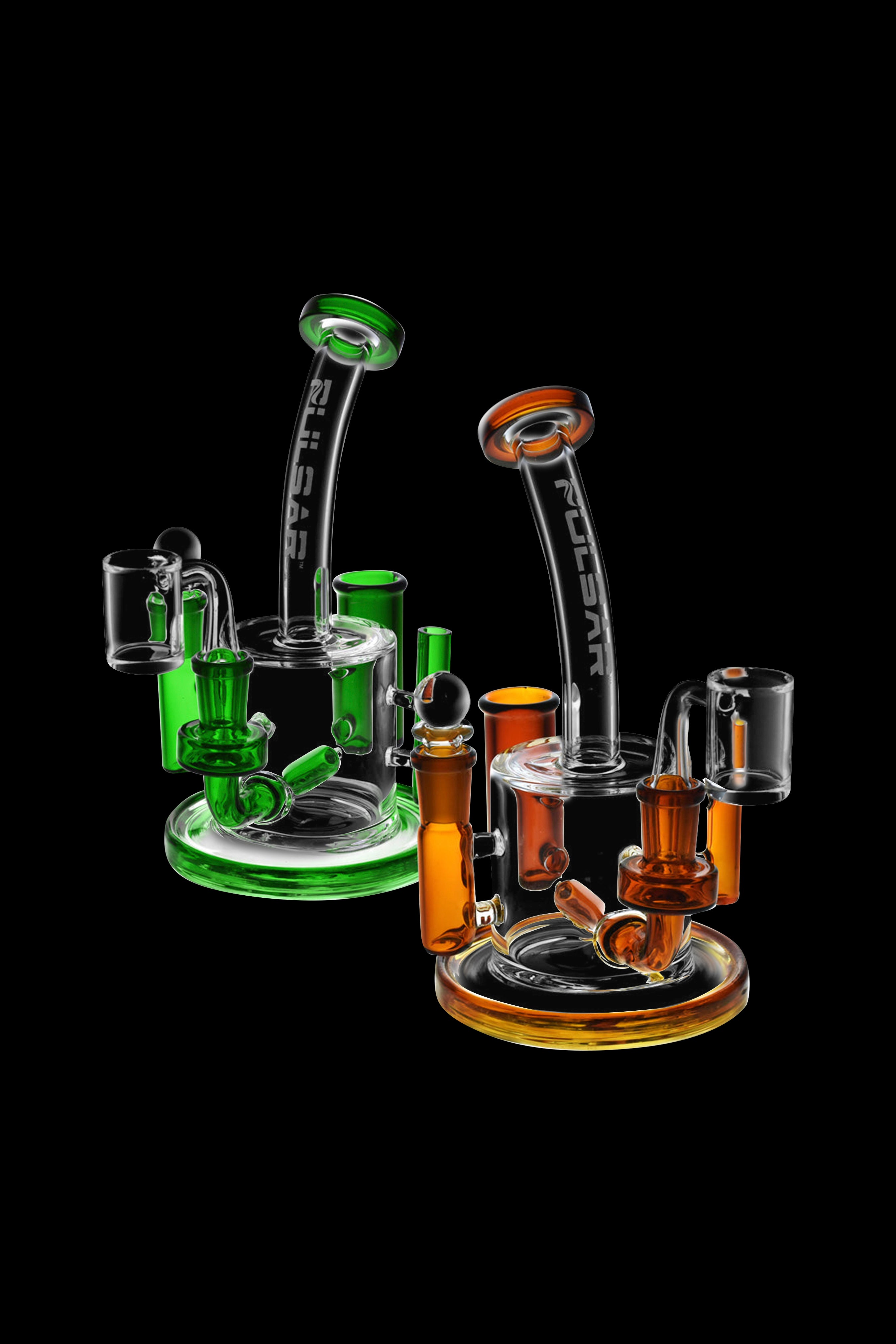 Two colorful glass rigs with dab nails, isolated on a black background.