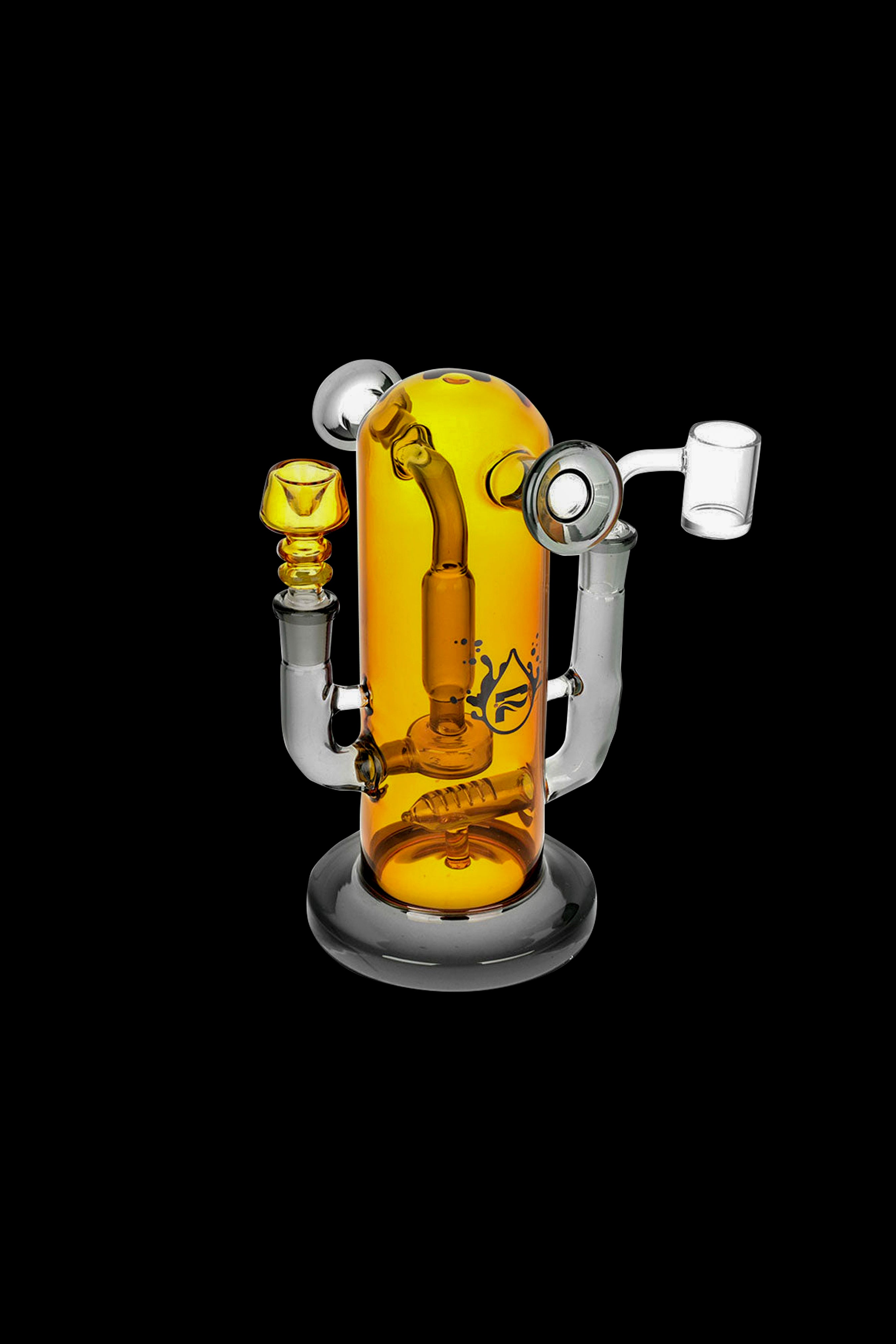 Amber glass dab rig with percolator and attachments on a black background.