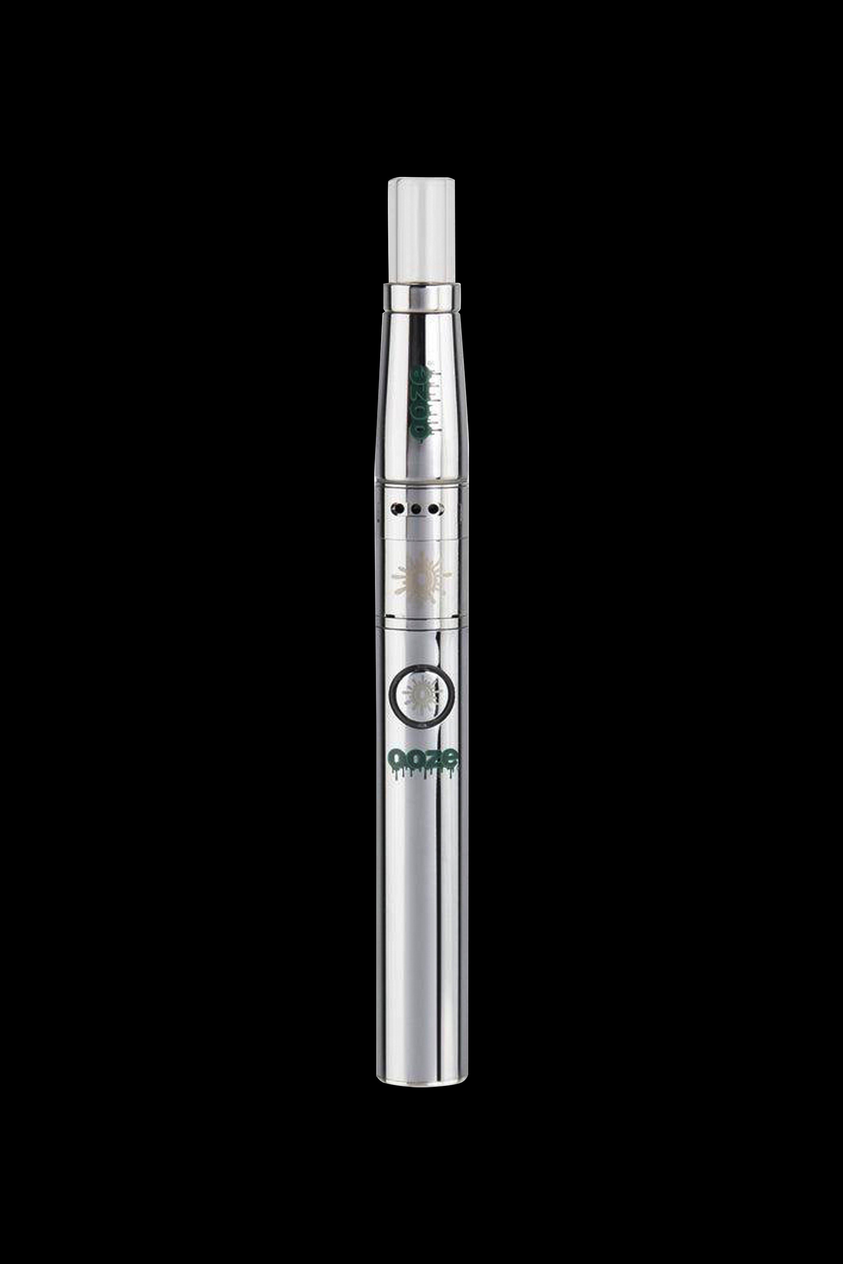 Silver cannabis vape pen with leaf detailing on a black background.