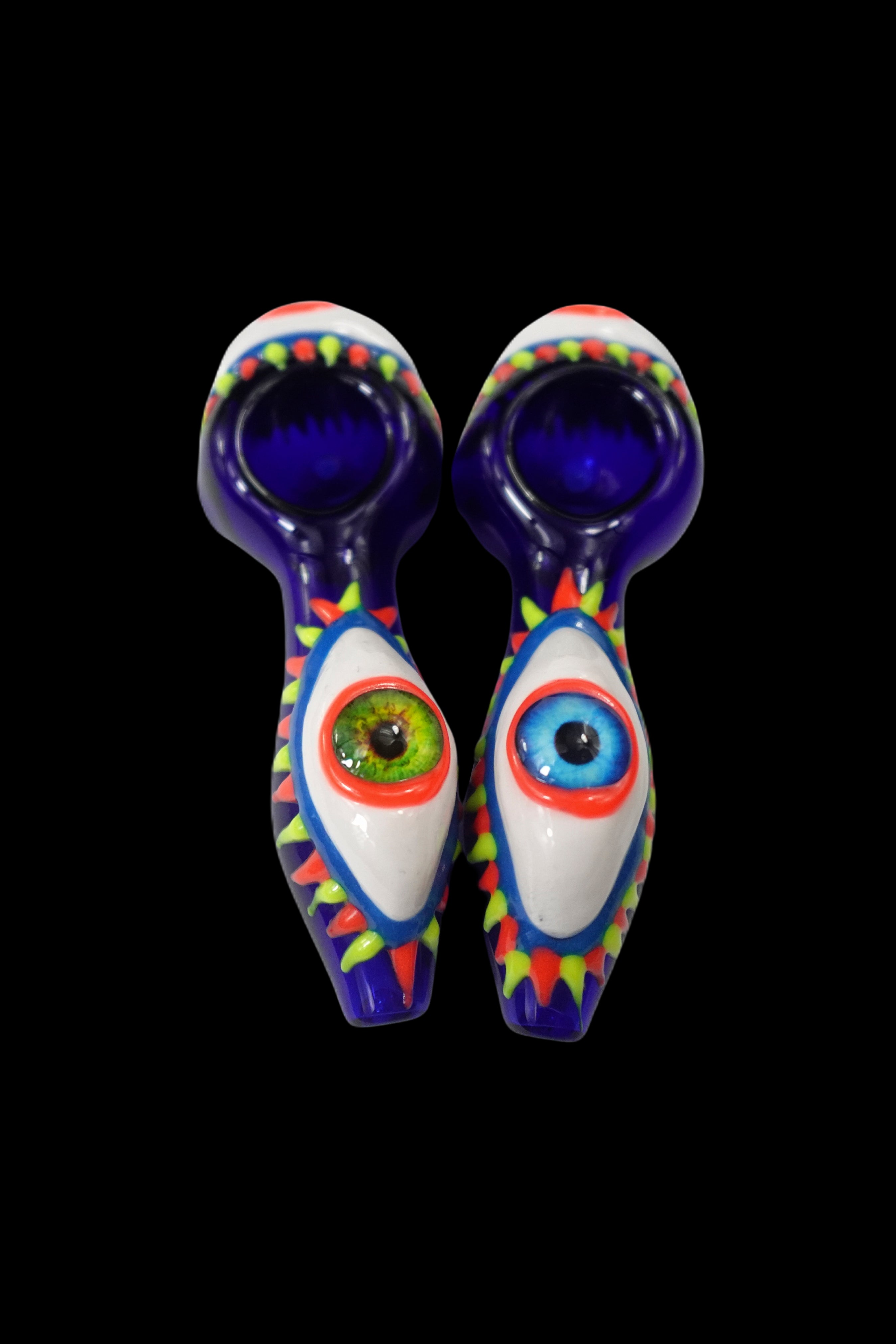 Two colorful glass pipes shaped like eyes with detailed iris and pupil designs, against a black background.