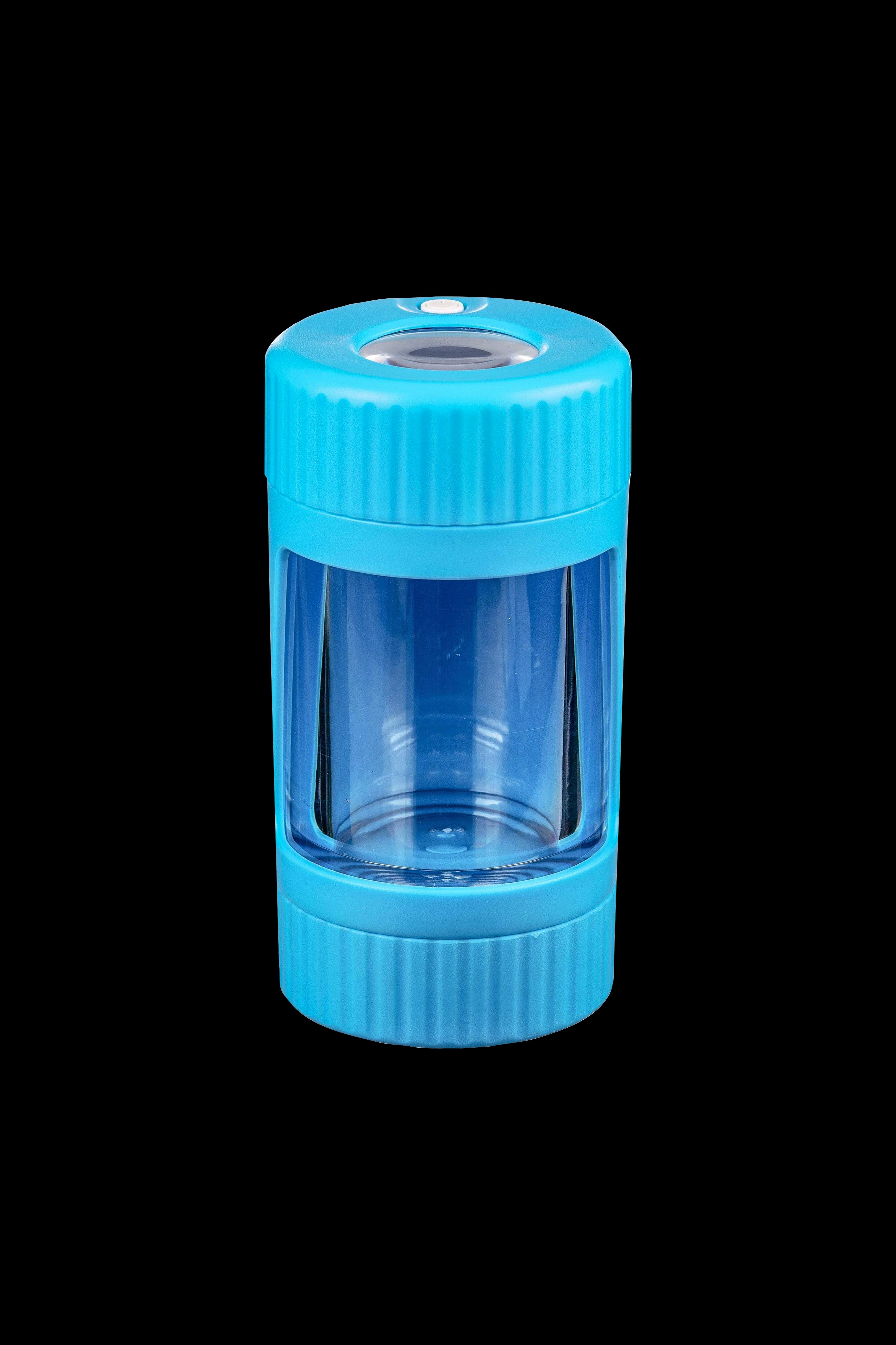 Blue cannabis grinder with a clear chamber.