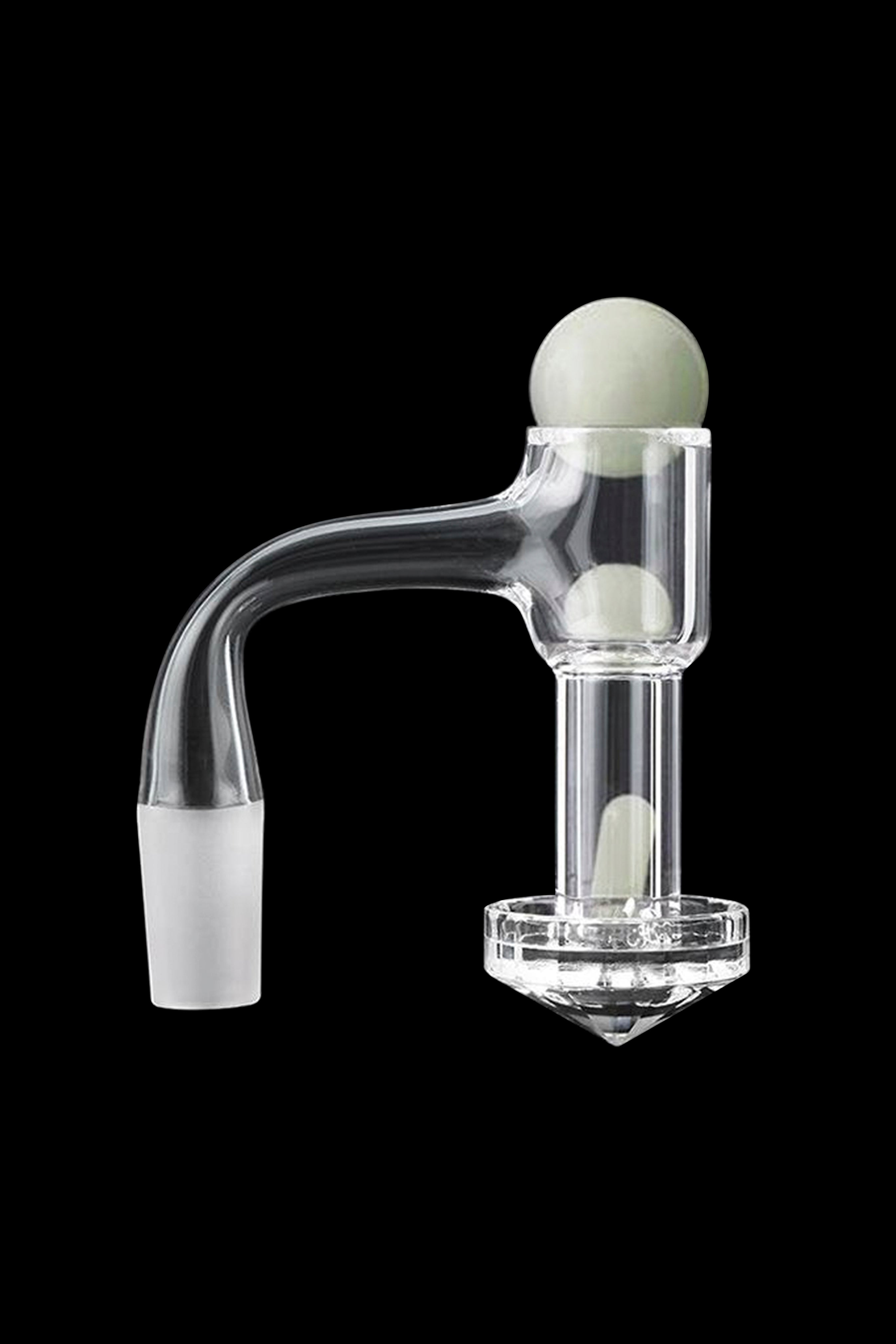 Clear glass dab rig with a green-tinted spherical topper and internal filtration.