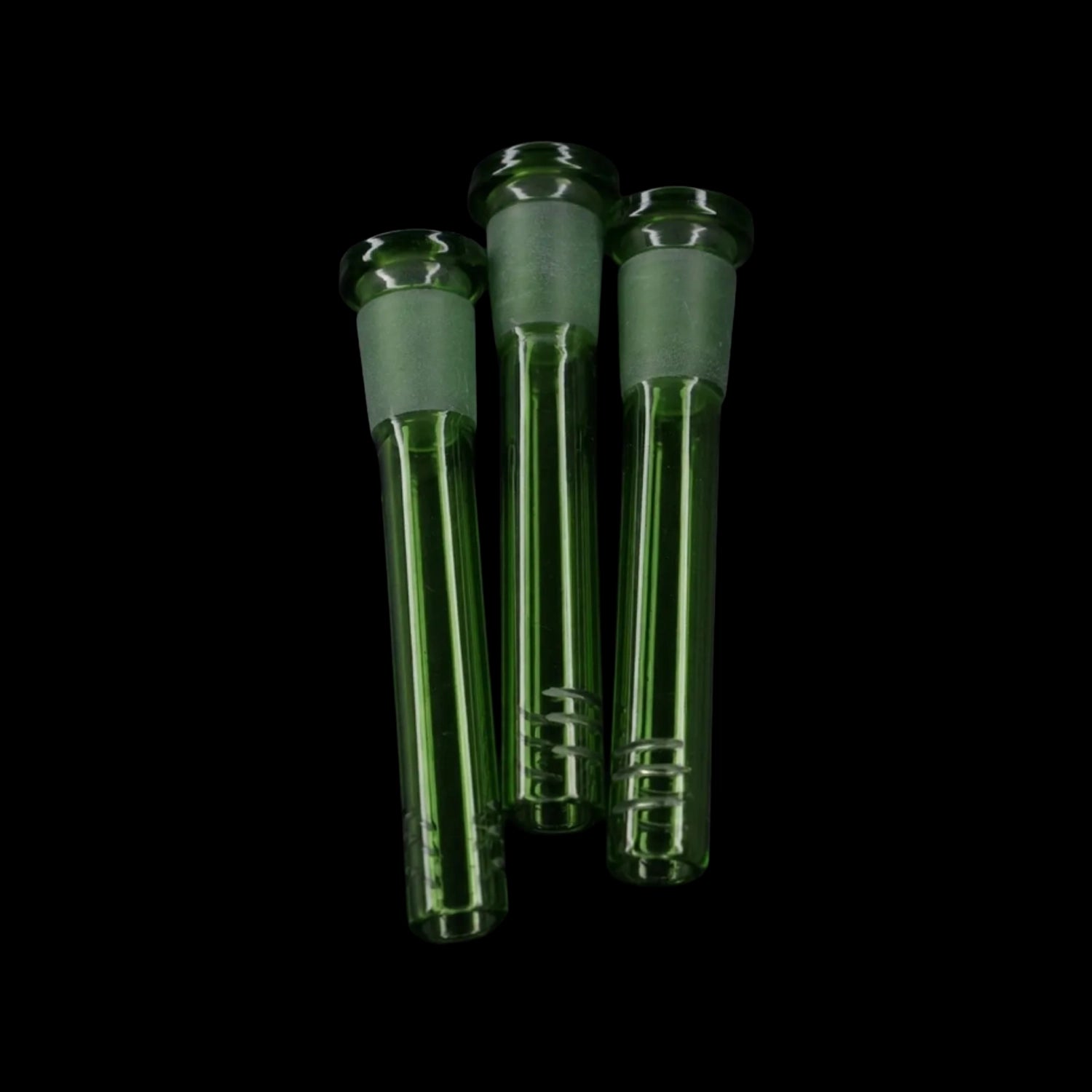 Close-up front view of three green Smoke Cartel Color Diffused Downstem - 3 in. pieces clustered against a black background.