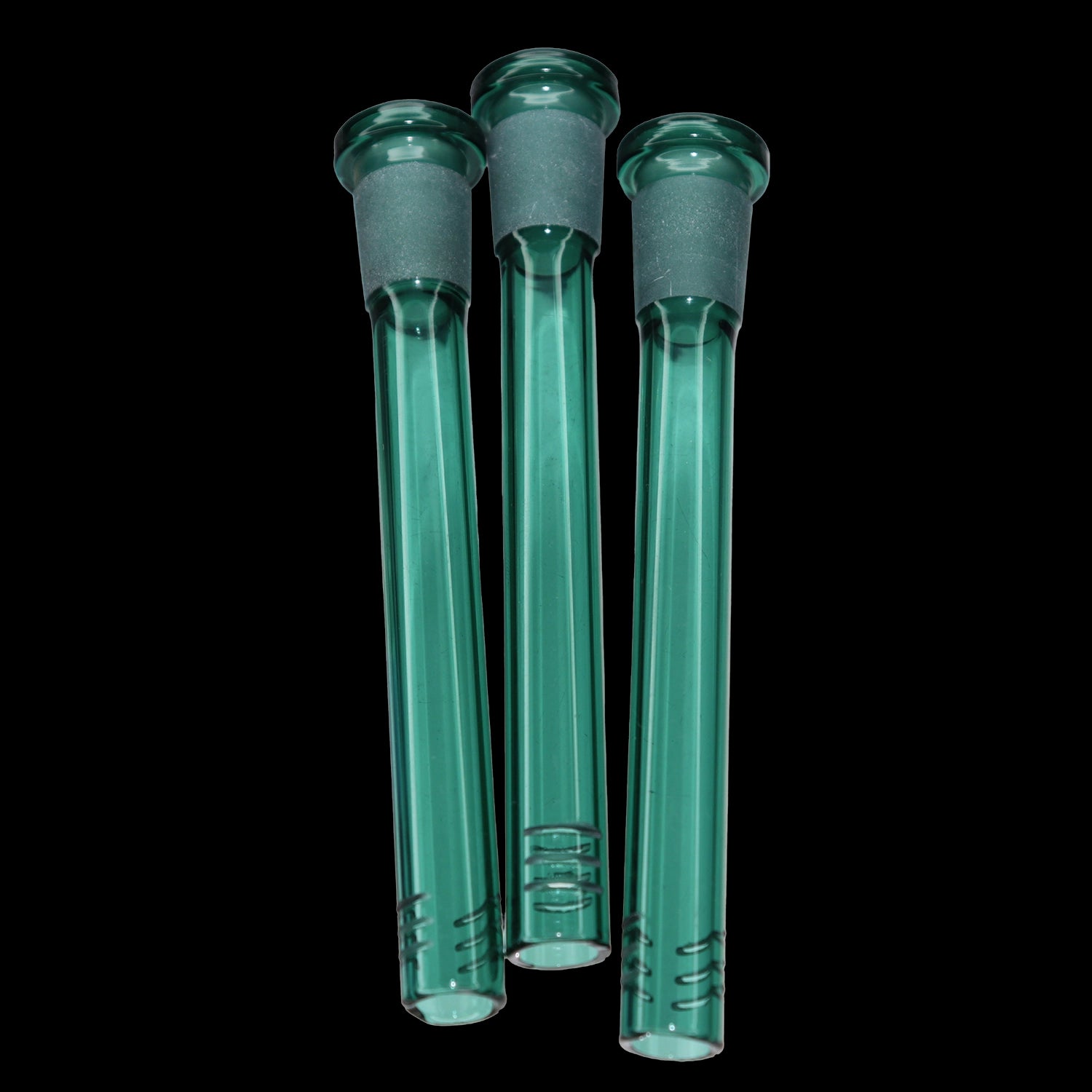 Close-up front view of three teal Smoke Cartel Color Diffused Downstem - 4.5 in. tubes aligned against a black background.