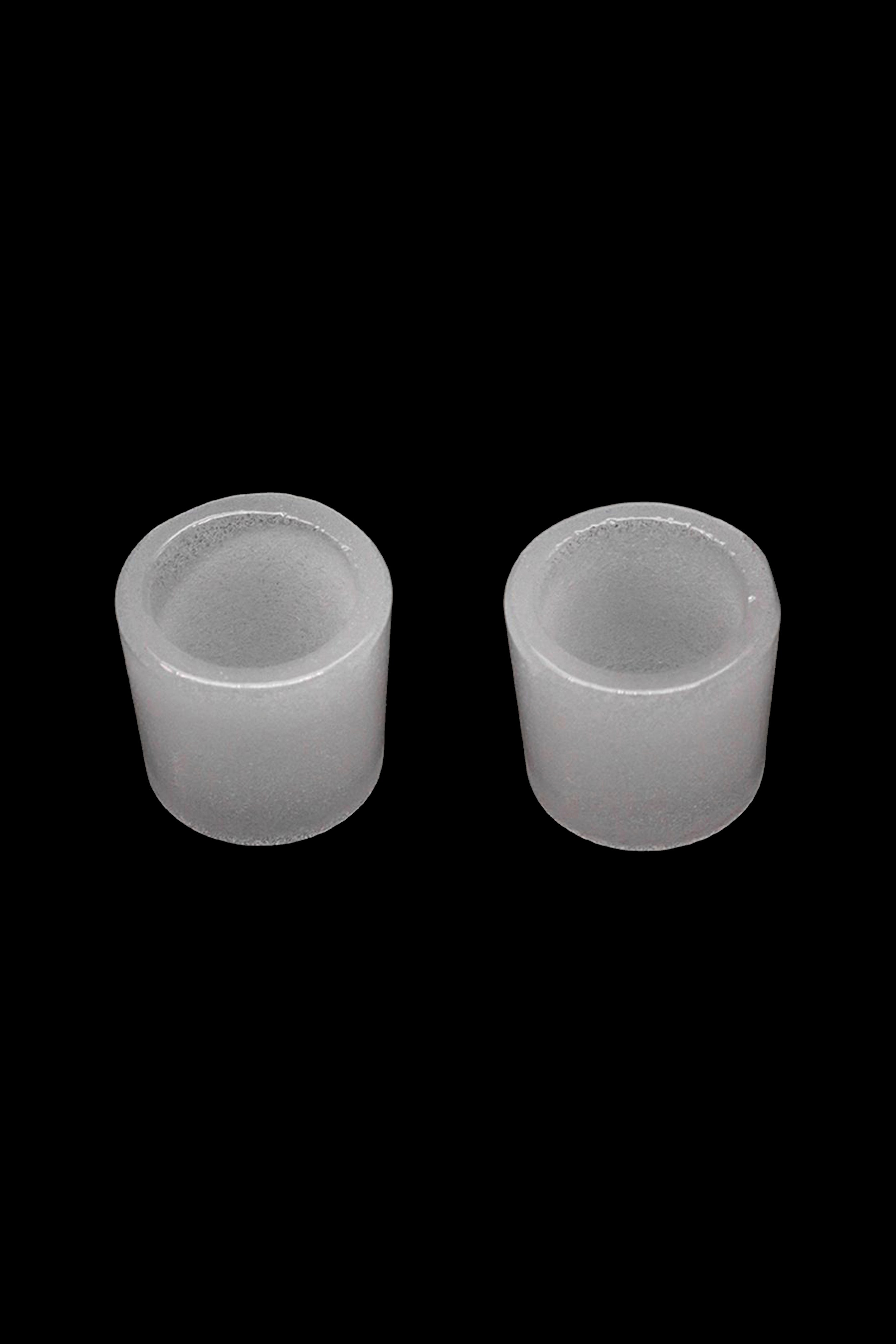 Frosted glass inserts for dab rigs on a black background.