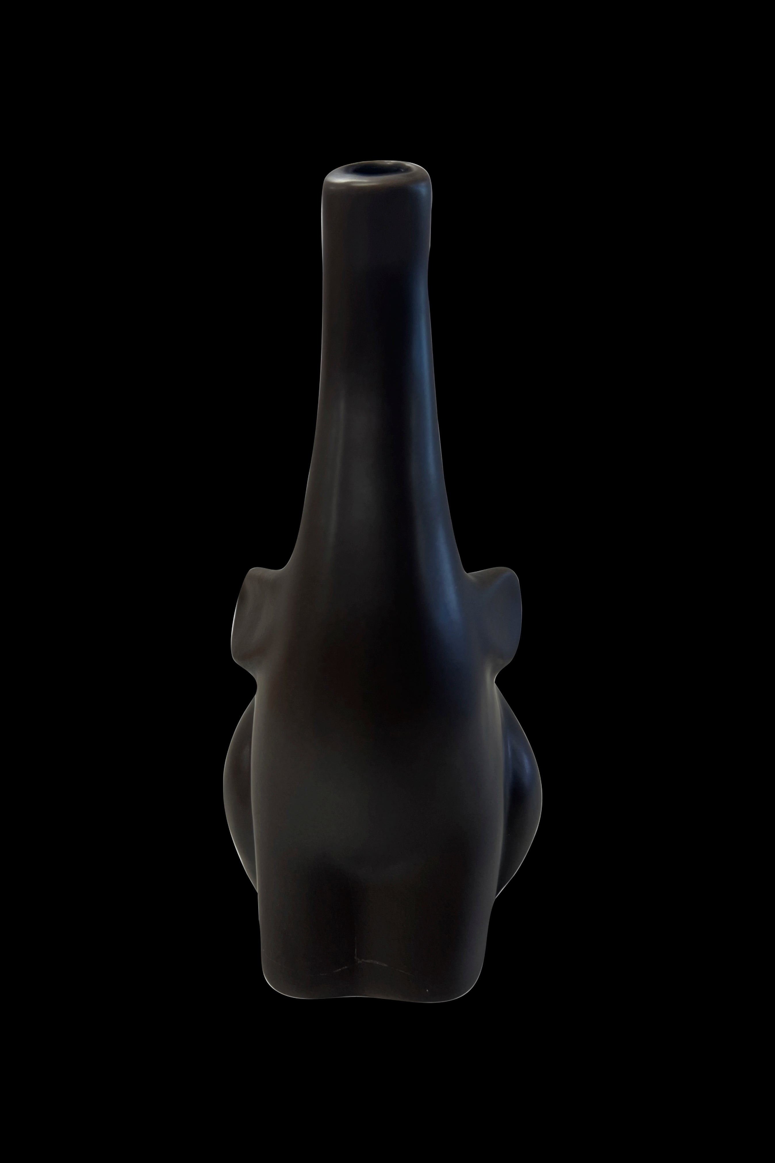 Black glass water pipe isolated on a black background.