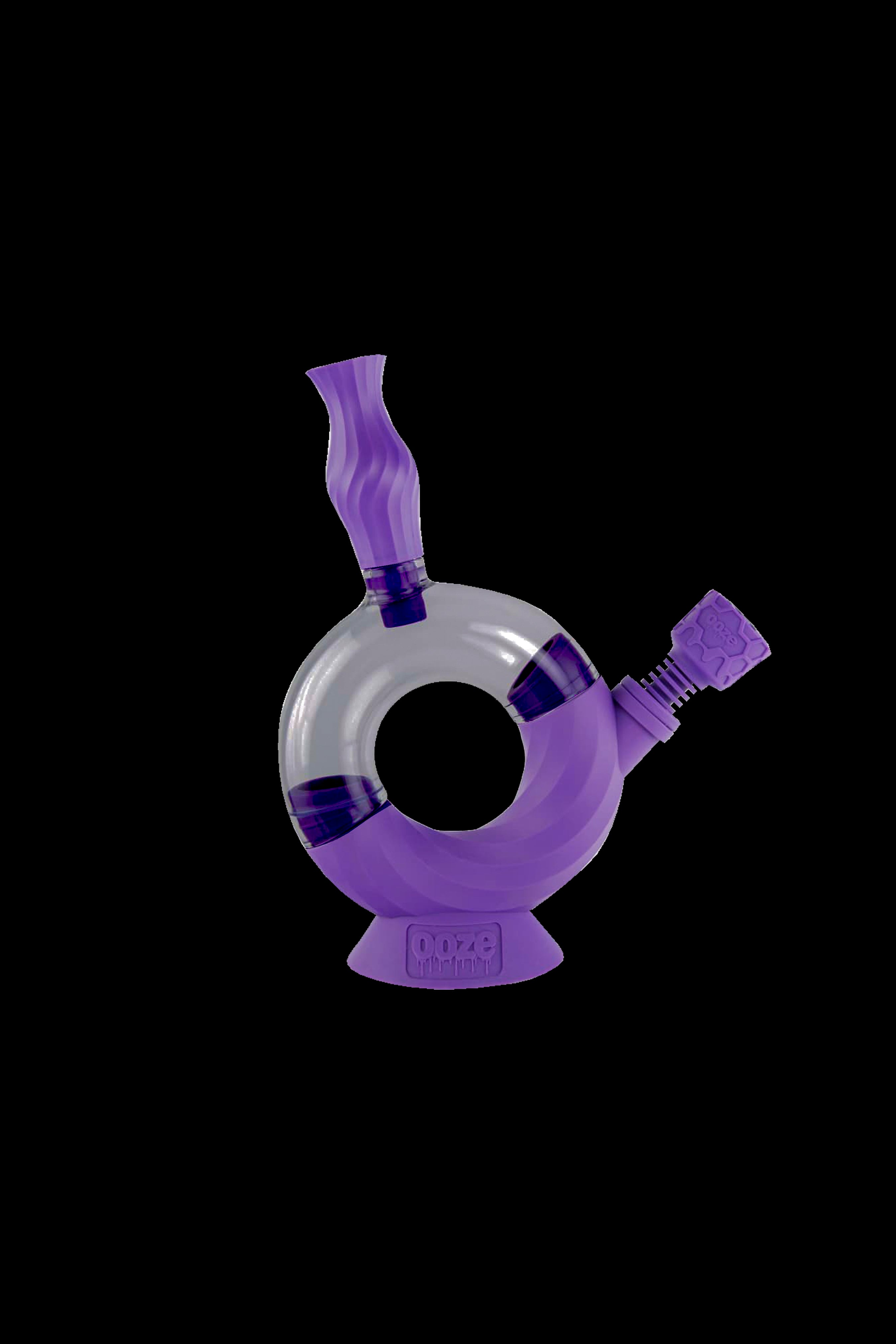 Purple silicone bubbler water pipe for smoking cannabis.
