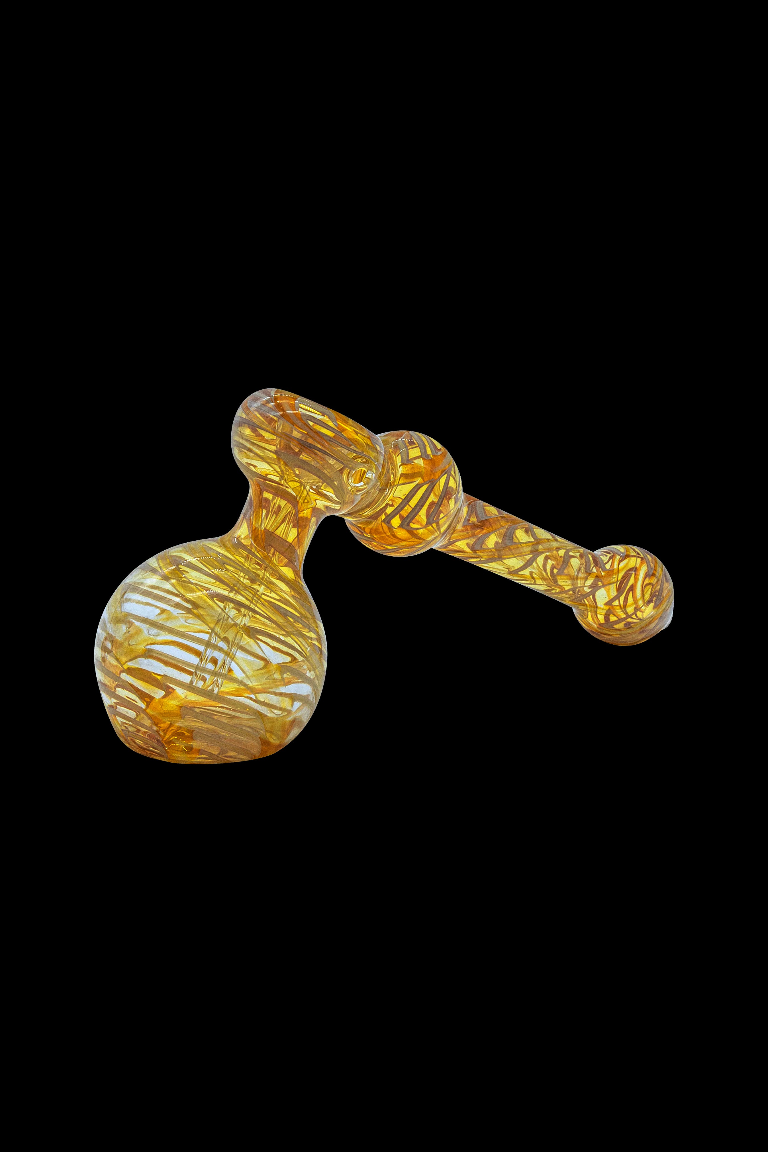Golden glass bubbler pipe for cannabis use.